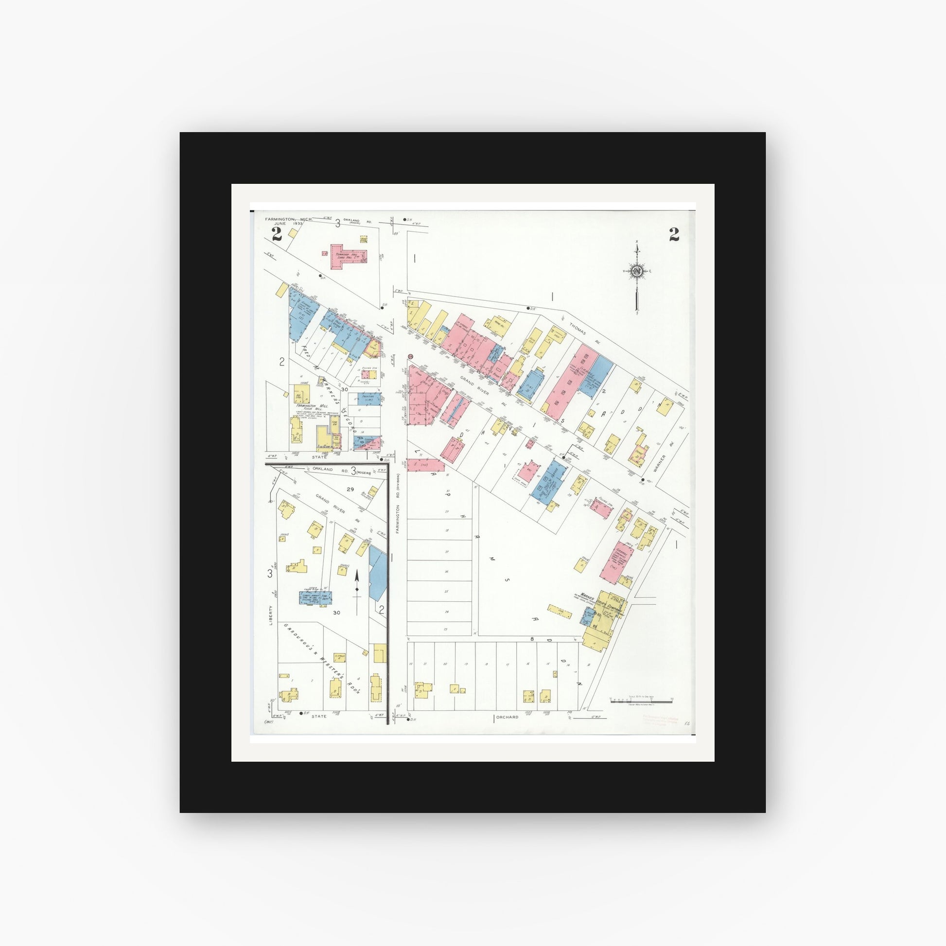 Old map wall art mockup — black gallery frame with white mat — Sanborn Fire Insurance Map from Farmington, Oakland County, Michigan (1933), Sheet #0002