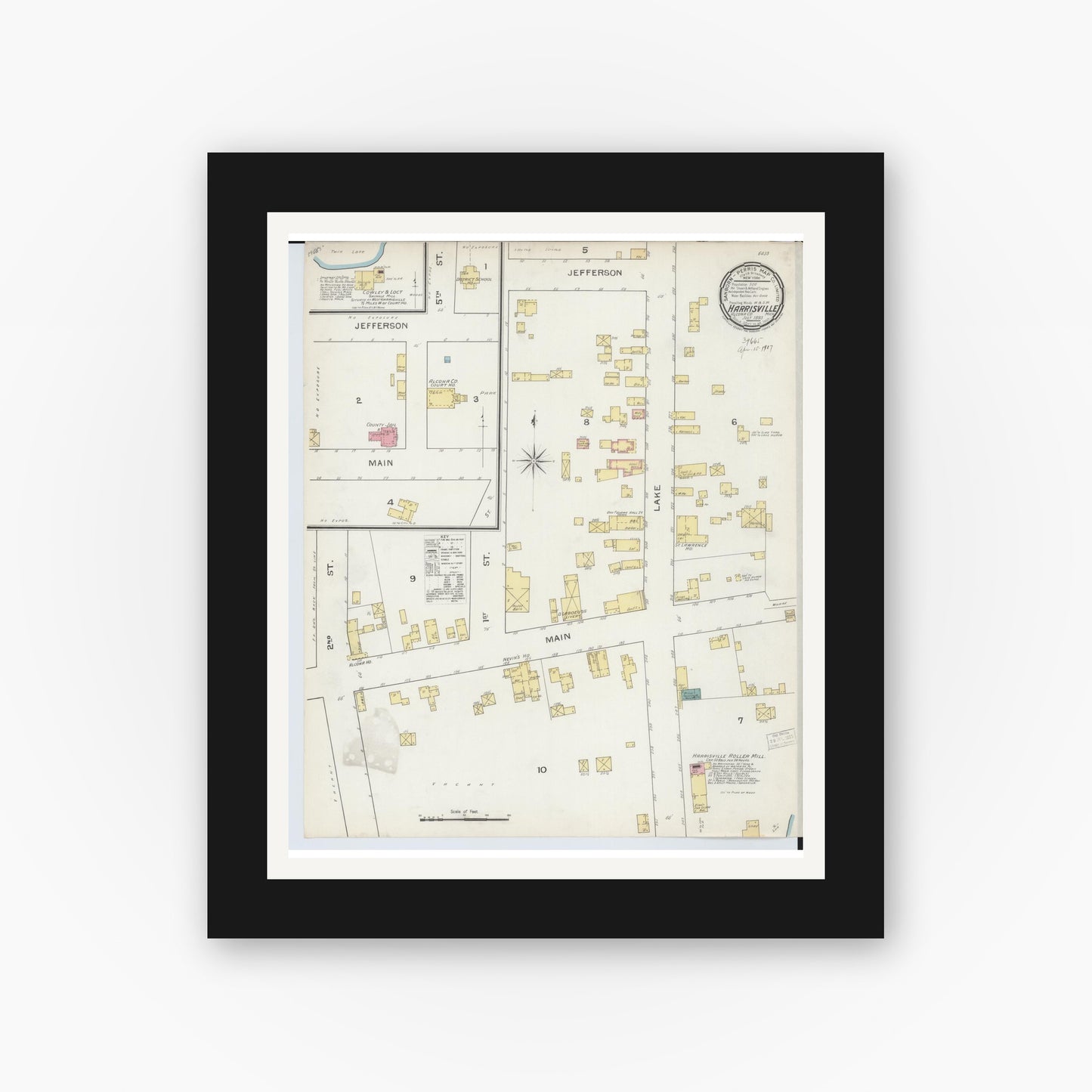 Old map wall art mockup — black gallery frame with white mat — Sanborn Fire Insurance Map from Harrisville, Alcona County, Michigan (1893), Sheet #0001