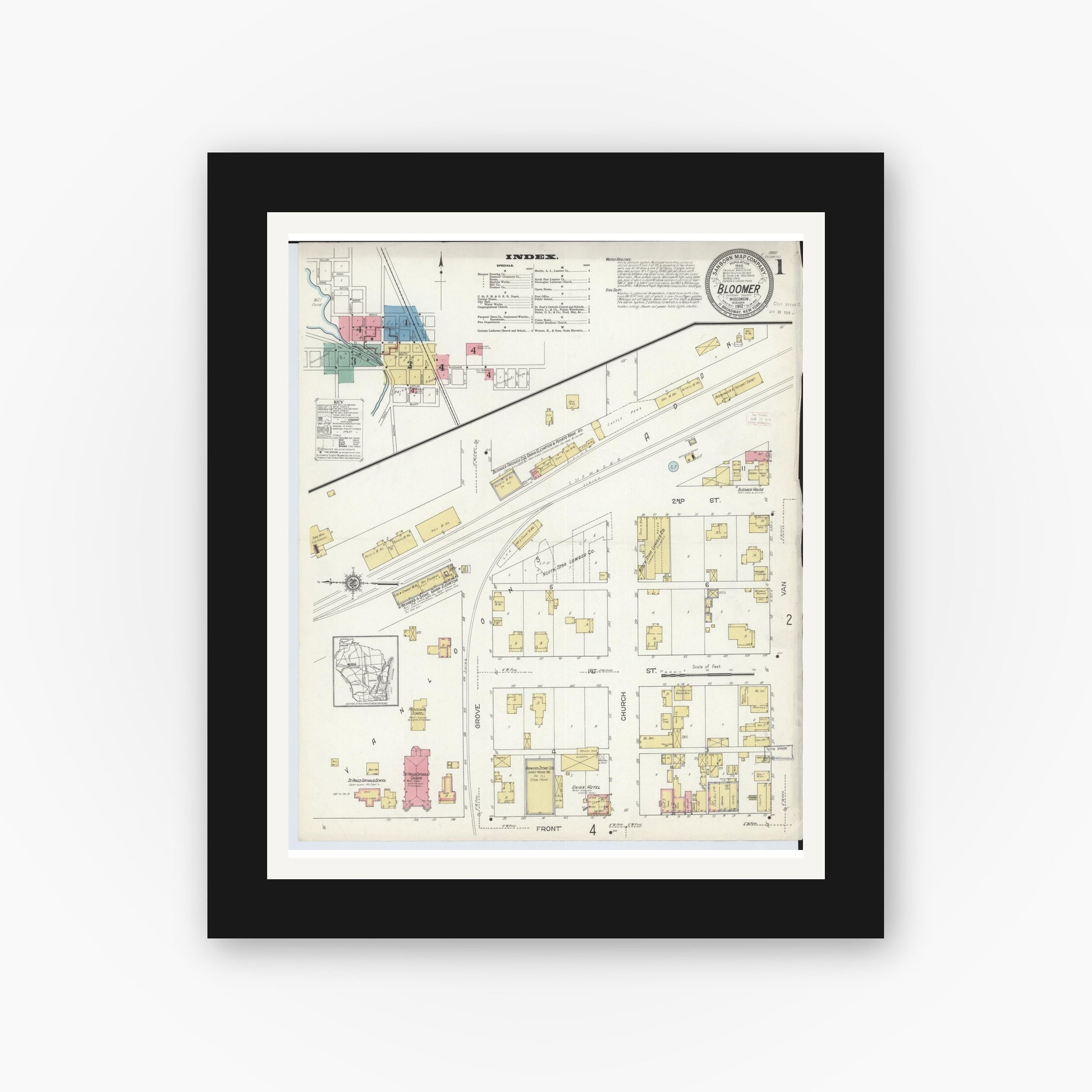 Old map wall art mockup — black gallery frame with white mat — Sanborn Fire Insurance Map from Bloomer, Chippewa County, Wisconsin (1912), Sheet #0001