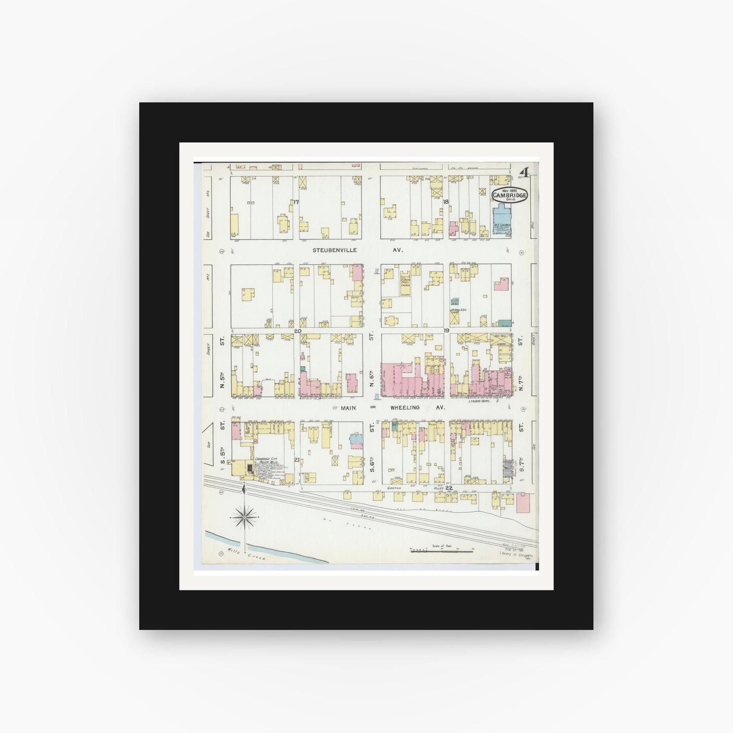 Old map wall art mockup — black gallery frame with white mat — Sanborn Fire Insurance Map from Cambridge, Guernsey County, Ohio (1892), Sheet #0004