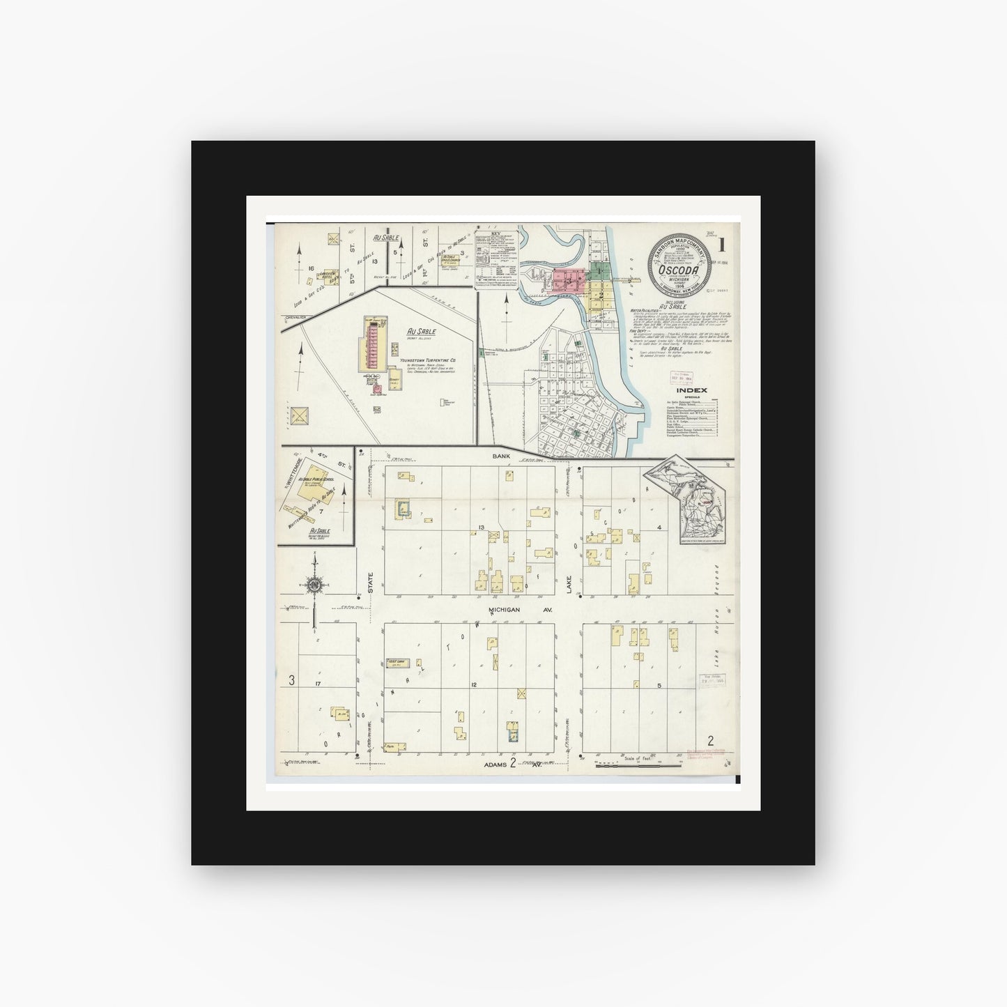 Old map wall art mockup — black gallery frame with white mat — Sanborn Fire Insurance Map from Oscoda, Iosco County, Michigan (1914) - Complete Map Set