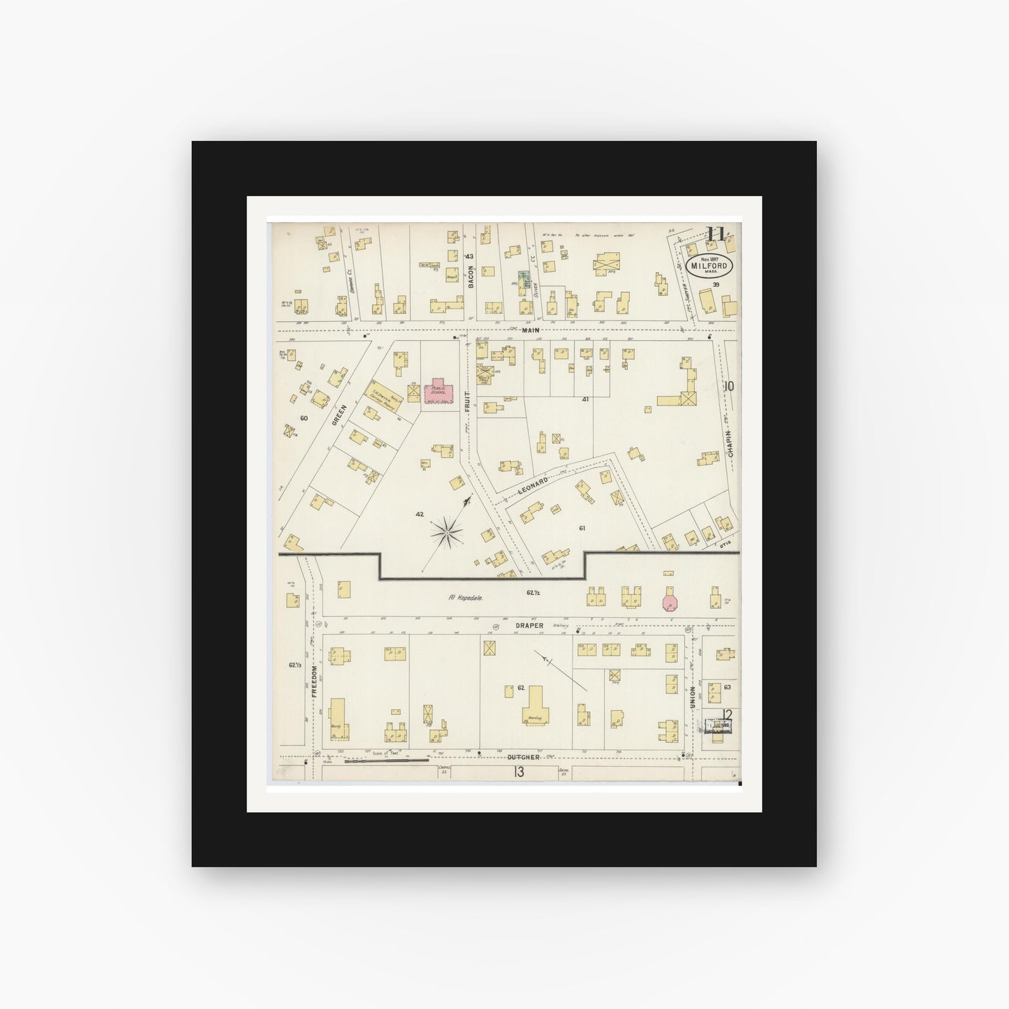 Old map wall art mockup — black gallery frame with white mat — Sanborn Fire Insurance Map from Milford, Worcester County, Massachusetts (1897), Sheet #0011