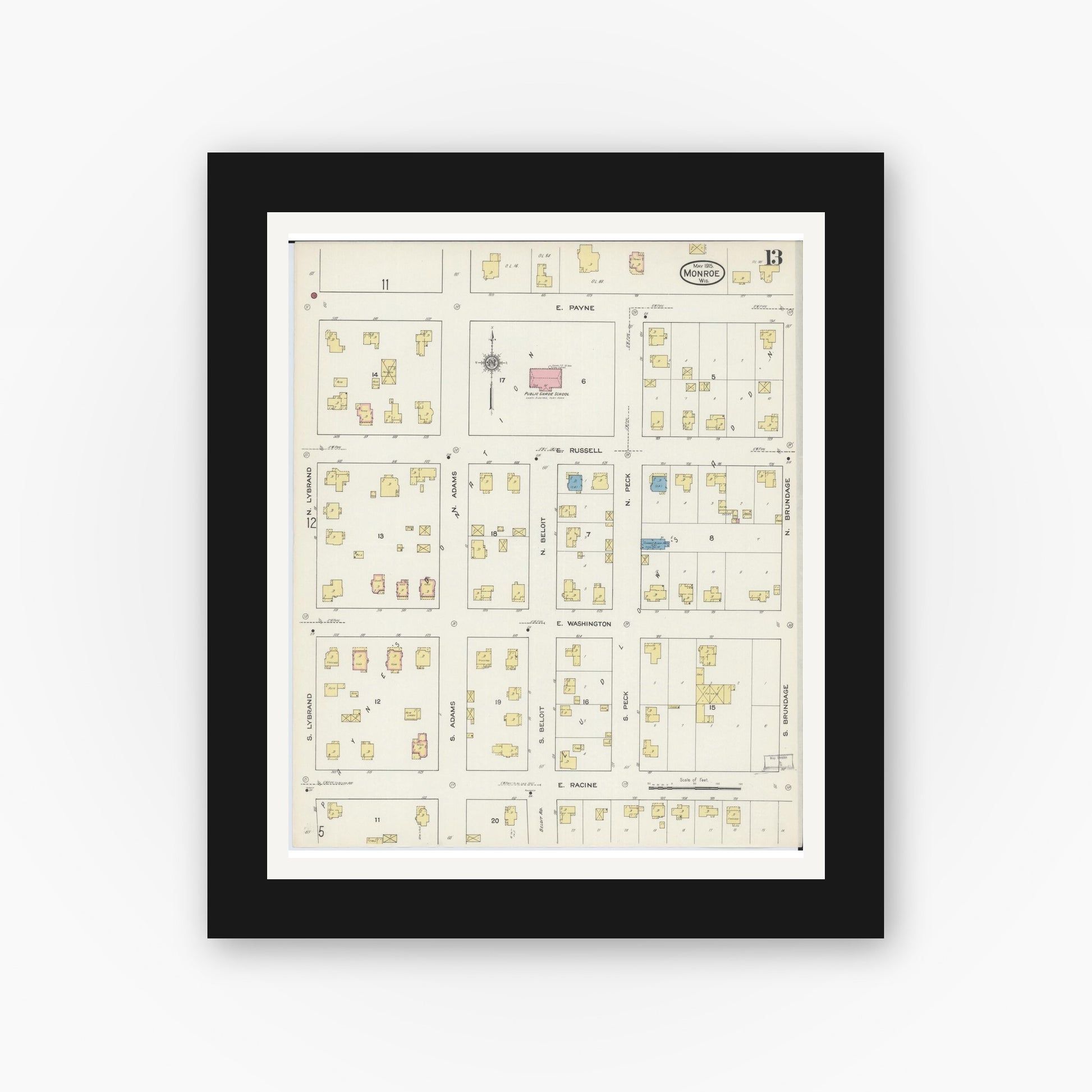 Old map wall art mockup — black gallery frame with white mat — Sanborn Fire Insurance Map from Monroe, Green County, Wisconsin (1915), Sheet #0013