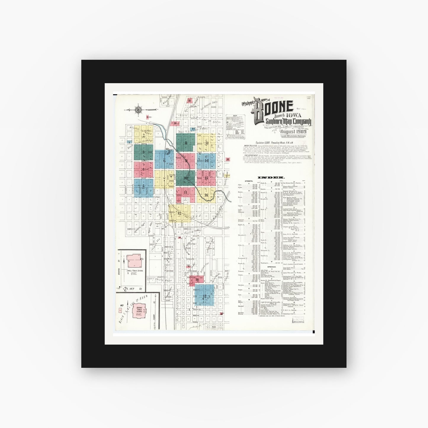 Old map wall art mockup — black gallery frame with white mat — Sanborn Fire Insurance Map from Boone, Boone County, Iowa (1909) â€” Complete Set