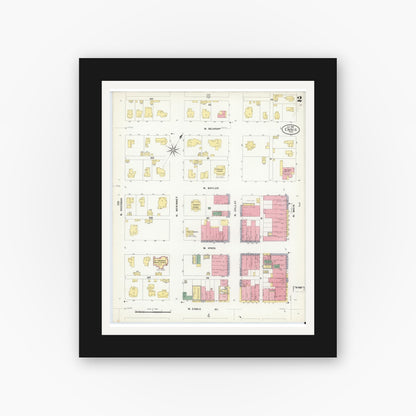 Old map wall art mockup — black gallery frame with white mat — Sanborn Fire Insurance Map from Ennis, Ellis County, Texas (1909), Sheet #0002