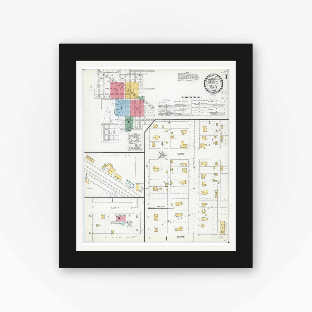 Old map wall art mockup — black gallery frame with white mat — Sanborn Fire Insurance Map from Wells, Faribault County, Minnesota (1900), Sheet #0001