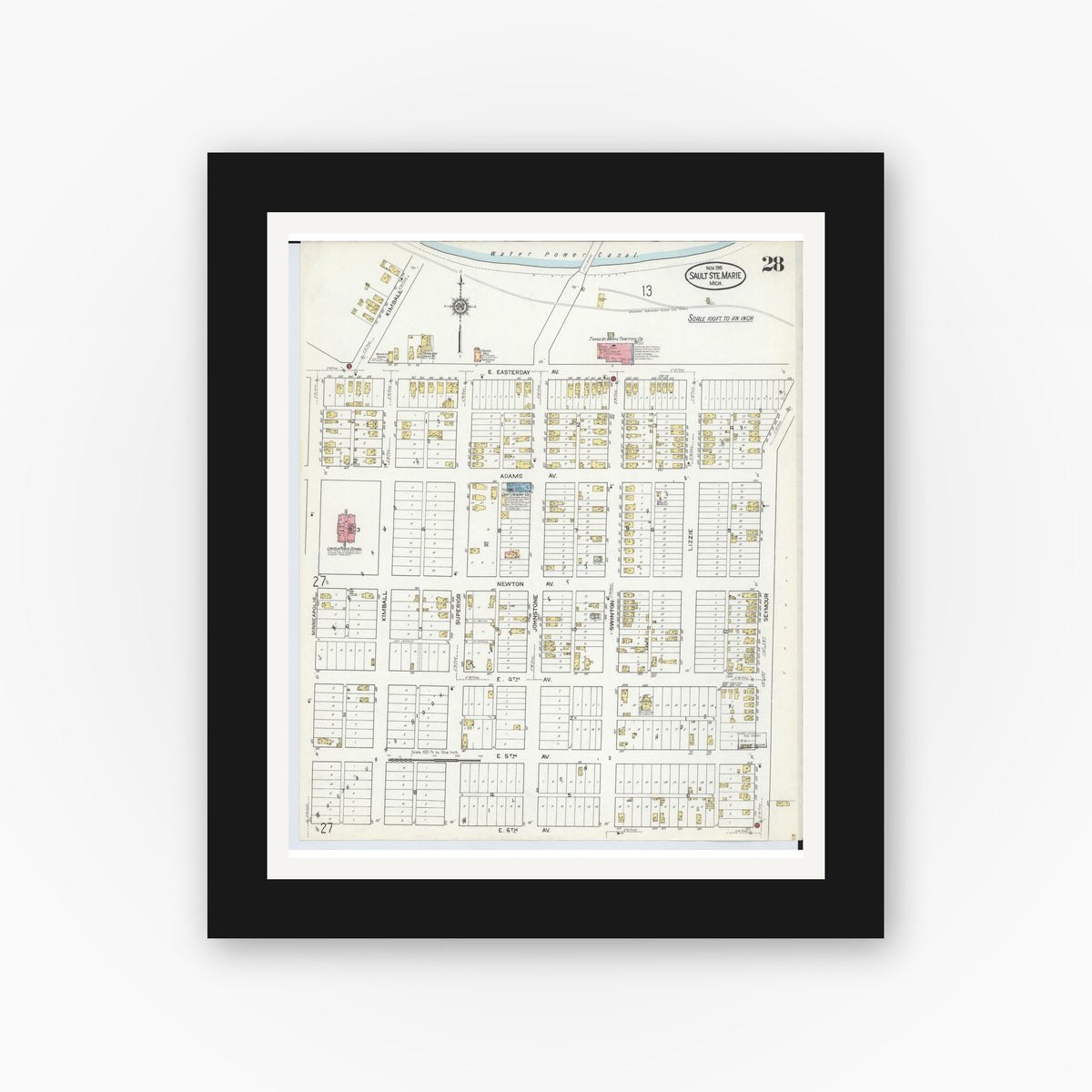 Old map wall art mockup — black gallery frame with white mat — Sanborn Fire Insurance Map from Sault Sainte Marie, Chippewa County, Michigan (1915), Sheet #0028
