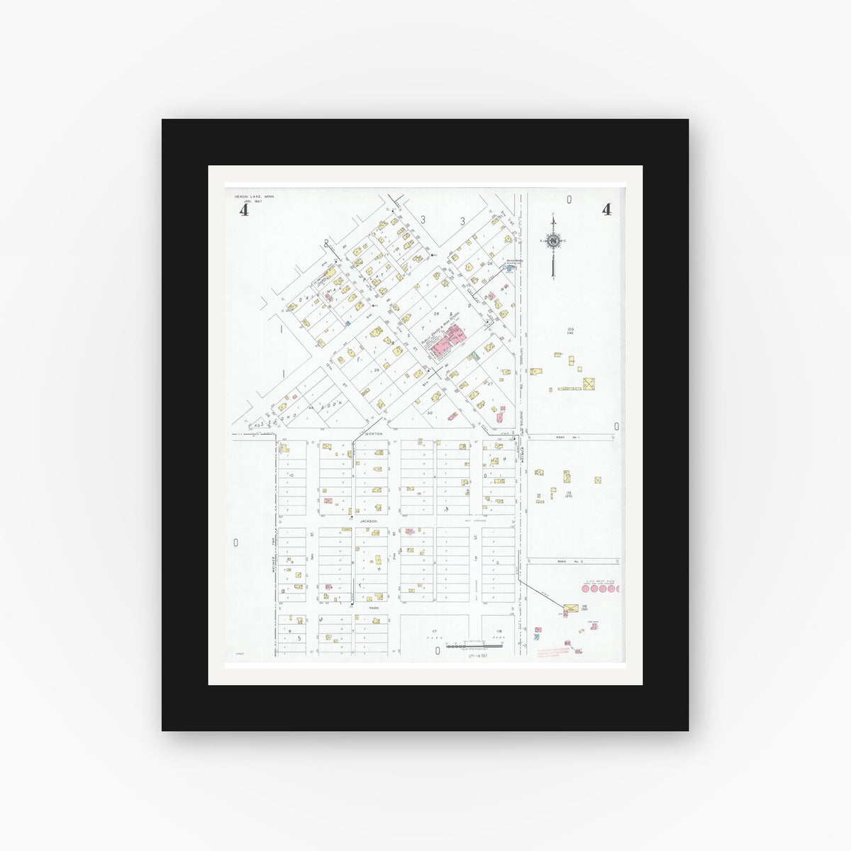 Old map wall art mockup — black gallery frame with white mat — Sanborn Fire Insurance Map from Heron Lake, Jackson County, Minnesota (1947), Sheet #0004