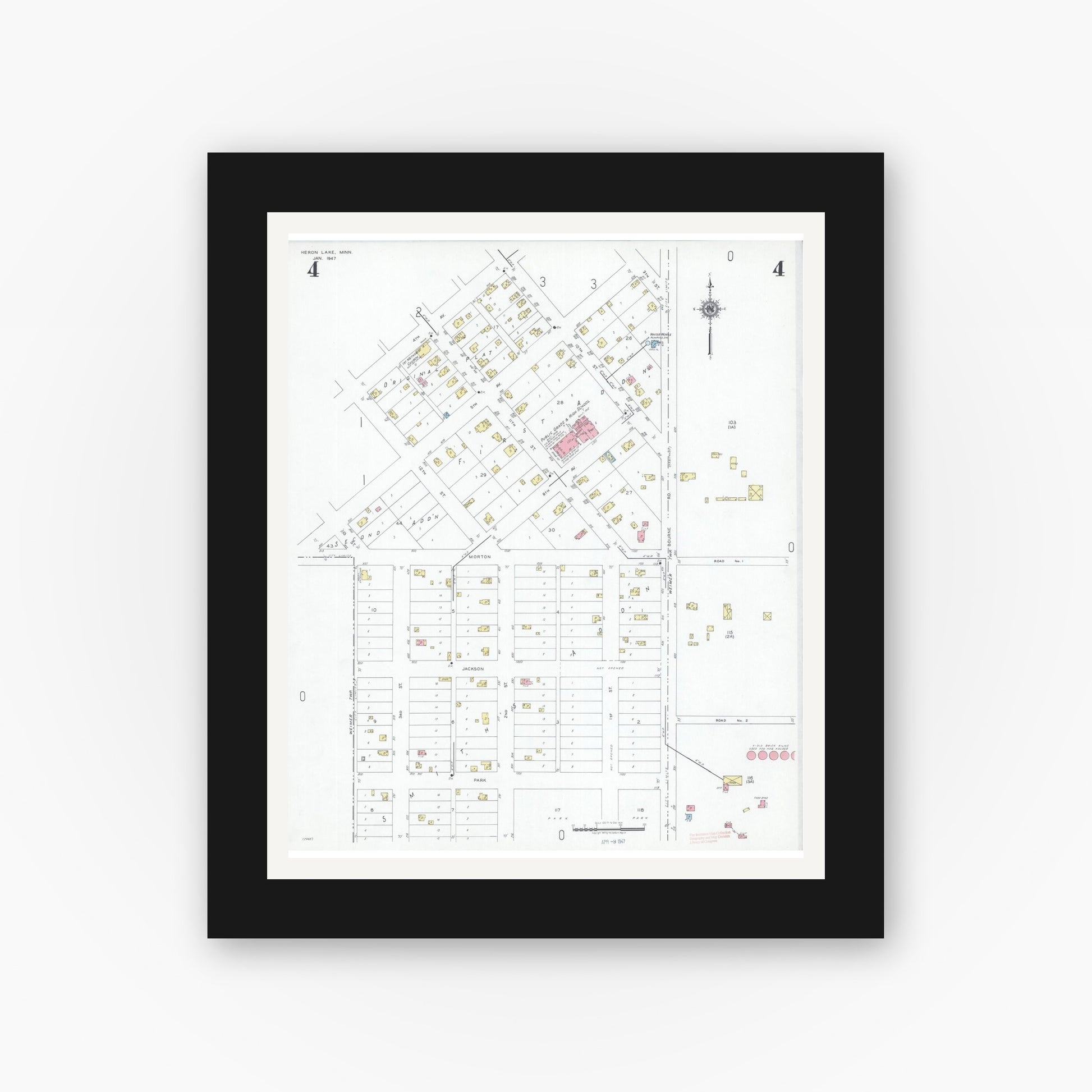 Old map wall art mockup — black gallery frame with white mat — Sanborn Fire Insurance Map from Heron Lake, Jackson County, Minnesota (1947), Sheet #0004