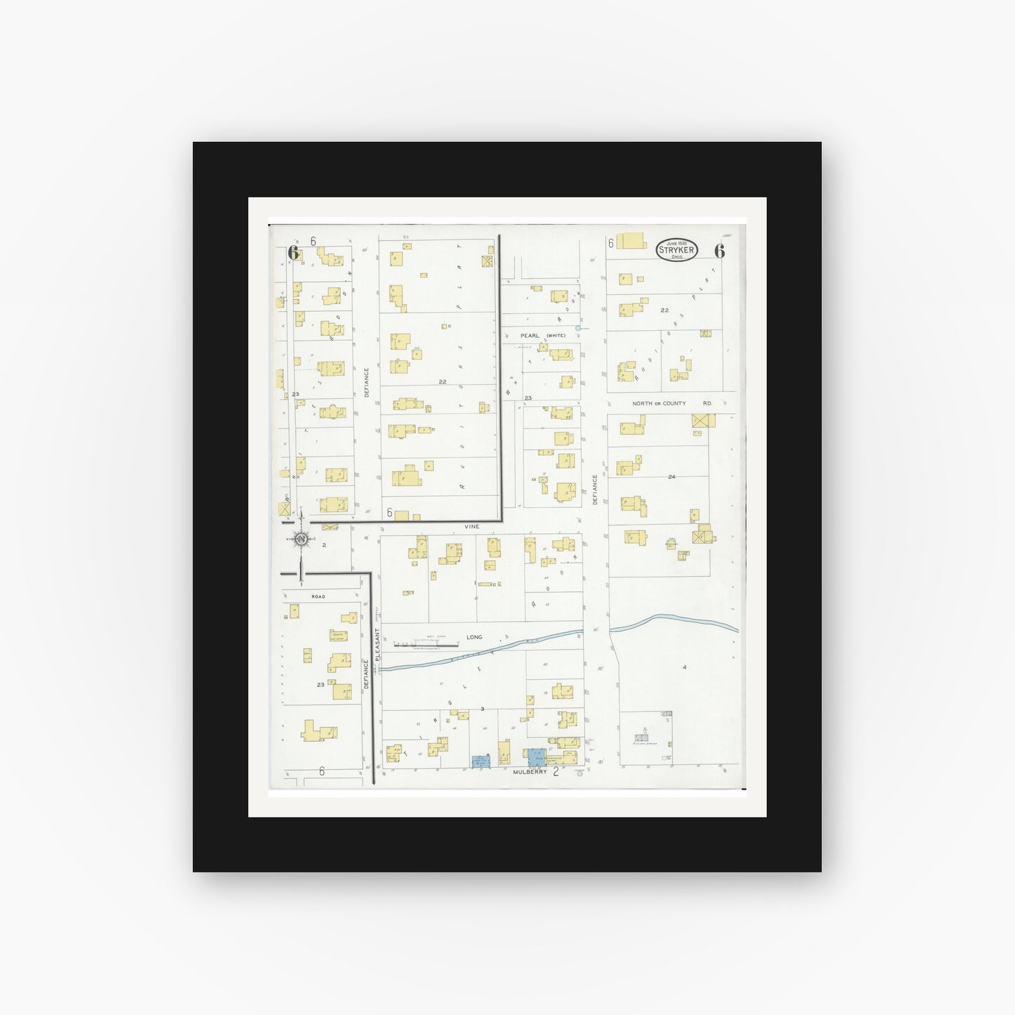 Old map wall art mockup — black gallery frame with white mat — Sanborn Fire Insurance Map from Stryker, Williams County, Ohio (1930), Sheet #0006