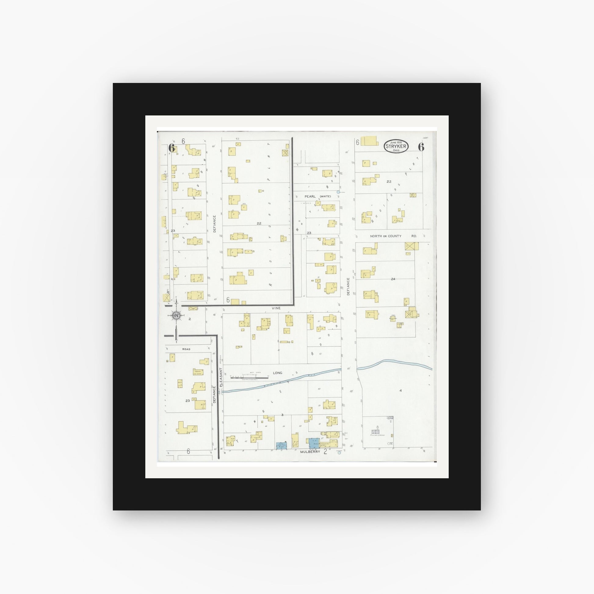 Old map wall art mockup — black gallery frame with white mat — Sanborn Fire Insurance Map from Stryker, Williams County, Ohio (1930), Sheet #0006