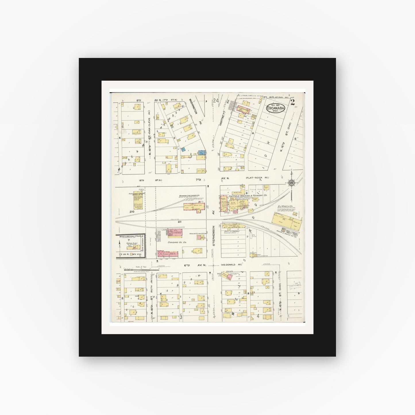 Old map wall art mockup — black gallery frame with white mat — Sanborn Fire Insurance Map from Escanaba, Delta County, Michigan (1921), Sheet #0002
