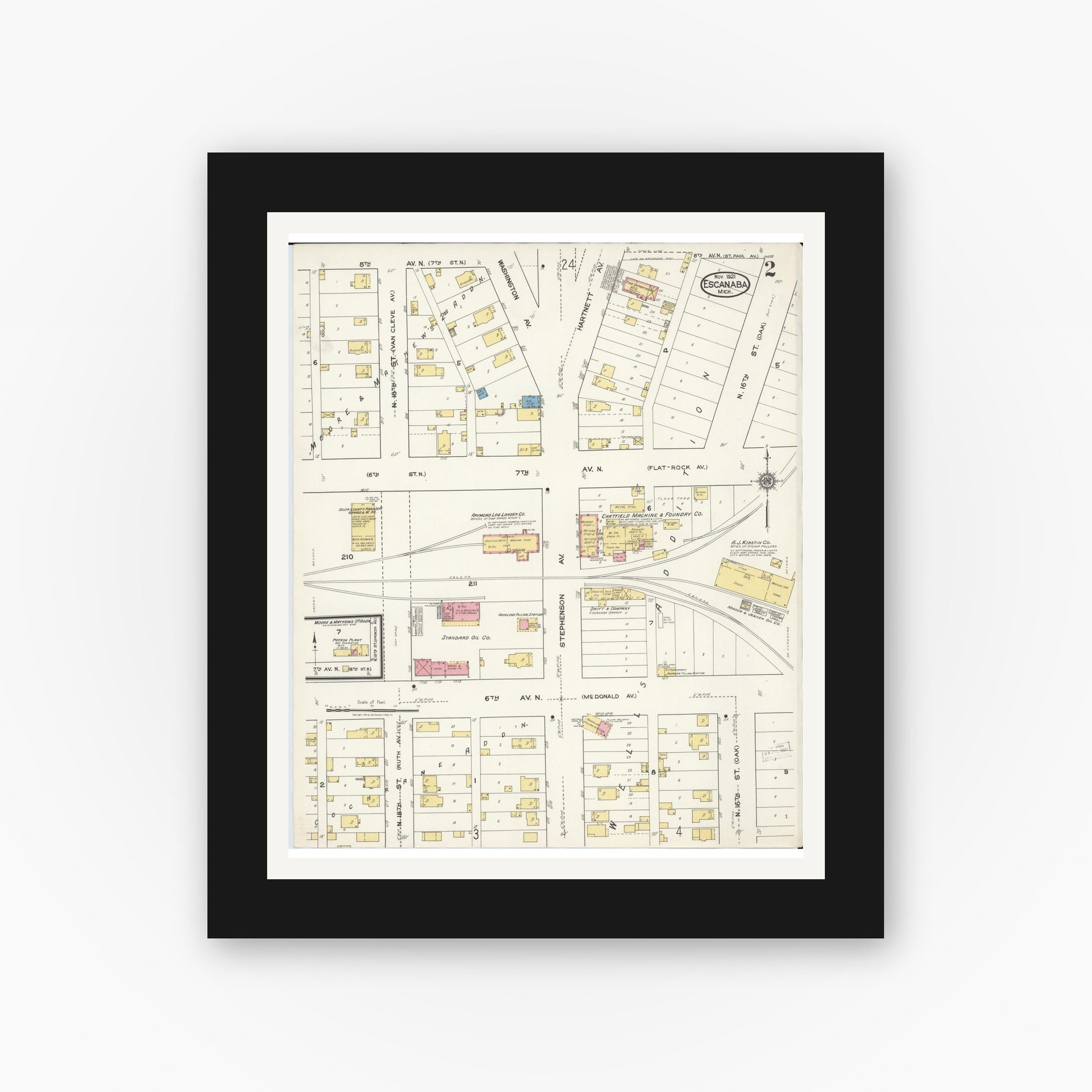 Old map wall art mockup — black gallery frame with white mat — Sanborn Fire Insurance Map from Escanaba, Delta County, Michigan (1921), Sheet #0002