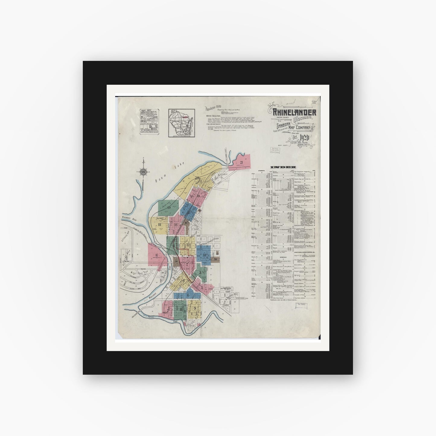 Old map wall art mockup — black gallery frame with white mat — Sanborn Fire Insurance Map from Rhinelander, Oneida County, Wisconsin (1920), Sheet #0001