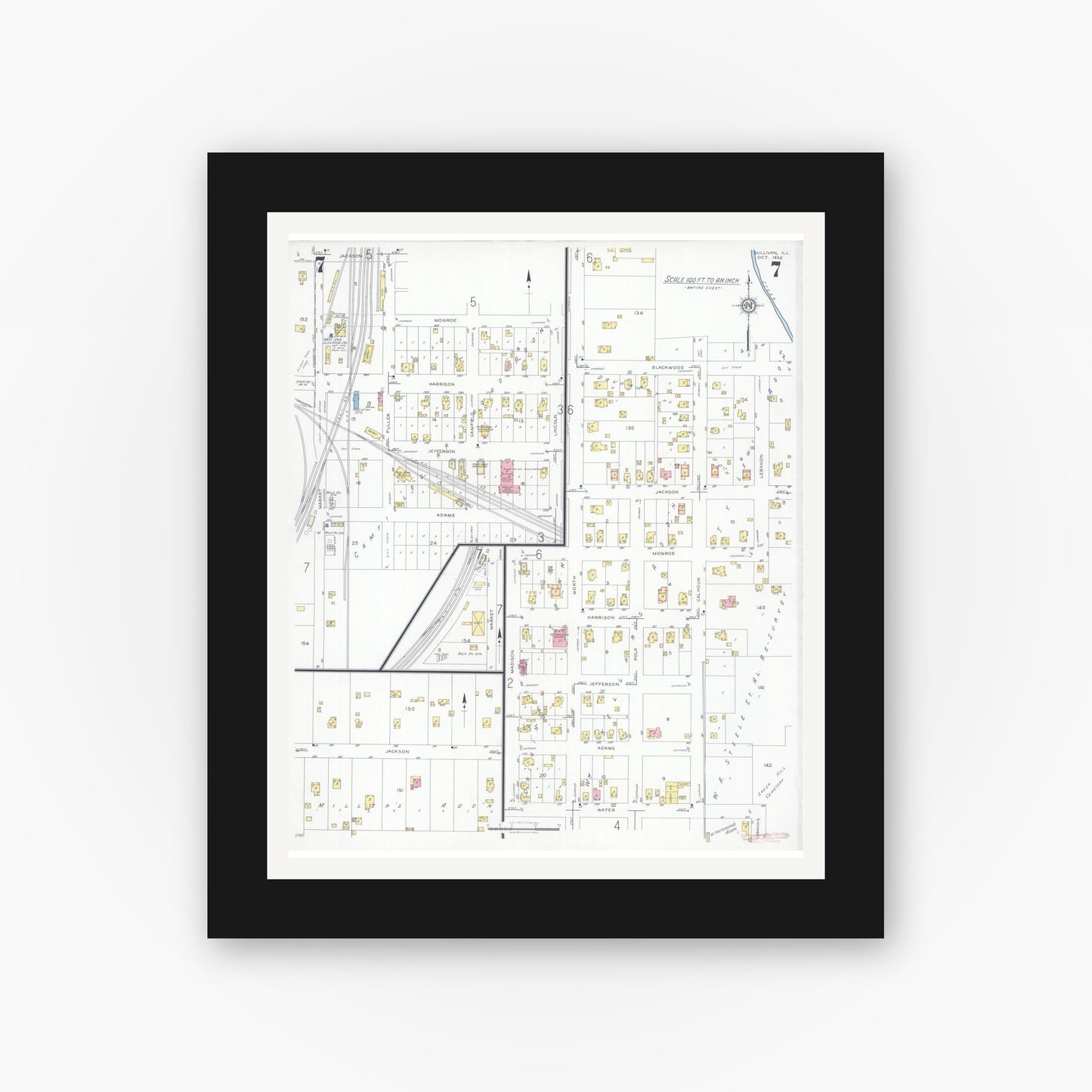 Old map wall art mockup — black gallery frame with white mat — Sanborn Fire Insurance Map from Sullivan, Moultrie County, Illinois (1932), Sheet #0007
