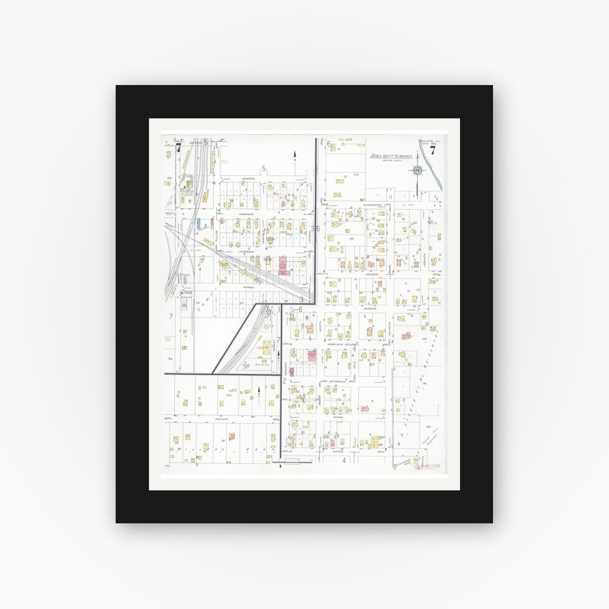 Old map wall art mockup — black gallery frame with white mat — Sanborn Fire Insurance Map from Sullivan, Moultrie County, Illinois (1932), Sheet #0007