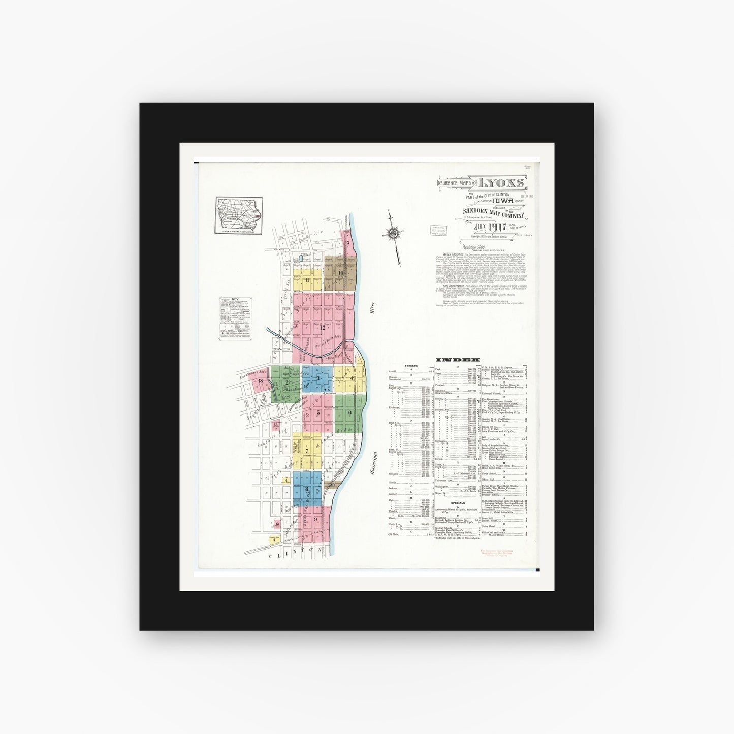 Old map wall art mockup — black gallery frame with white mat — Sanborn Fire Insurance Map from Lyons, Clinton County, Iowa (1917) â€” Complete Set