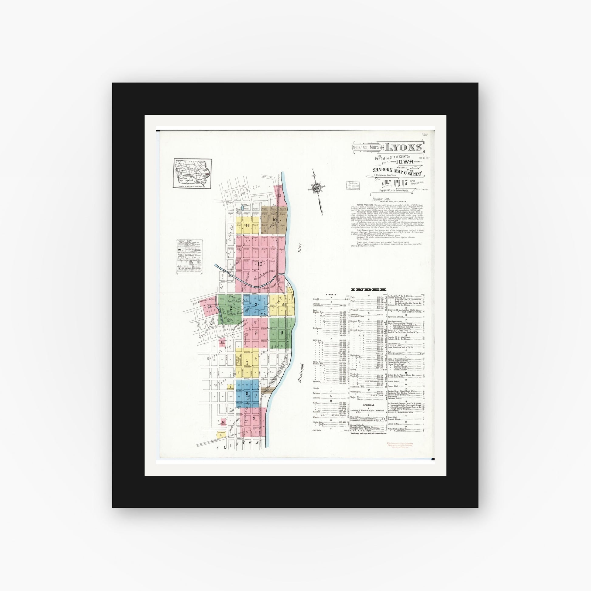 Old map wall art mockup — black gallery frame with white mat — Sanborn Fire Insurance Map from Lyons, Clinton County, Iowa (1917) â€” Complete Set
