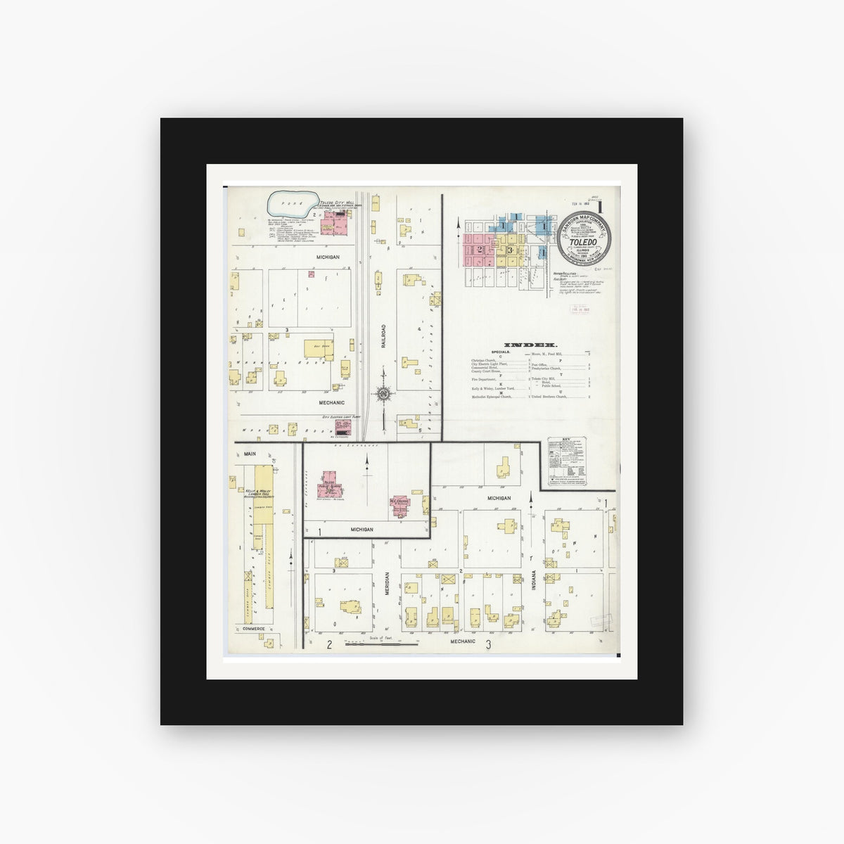 Old map wall art mockup — black gallery frame with white mat — Sanborn Fire Insurance Map from Toledo, Cumberland County, Illinois (1911), Sheet #0001