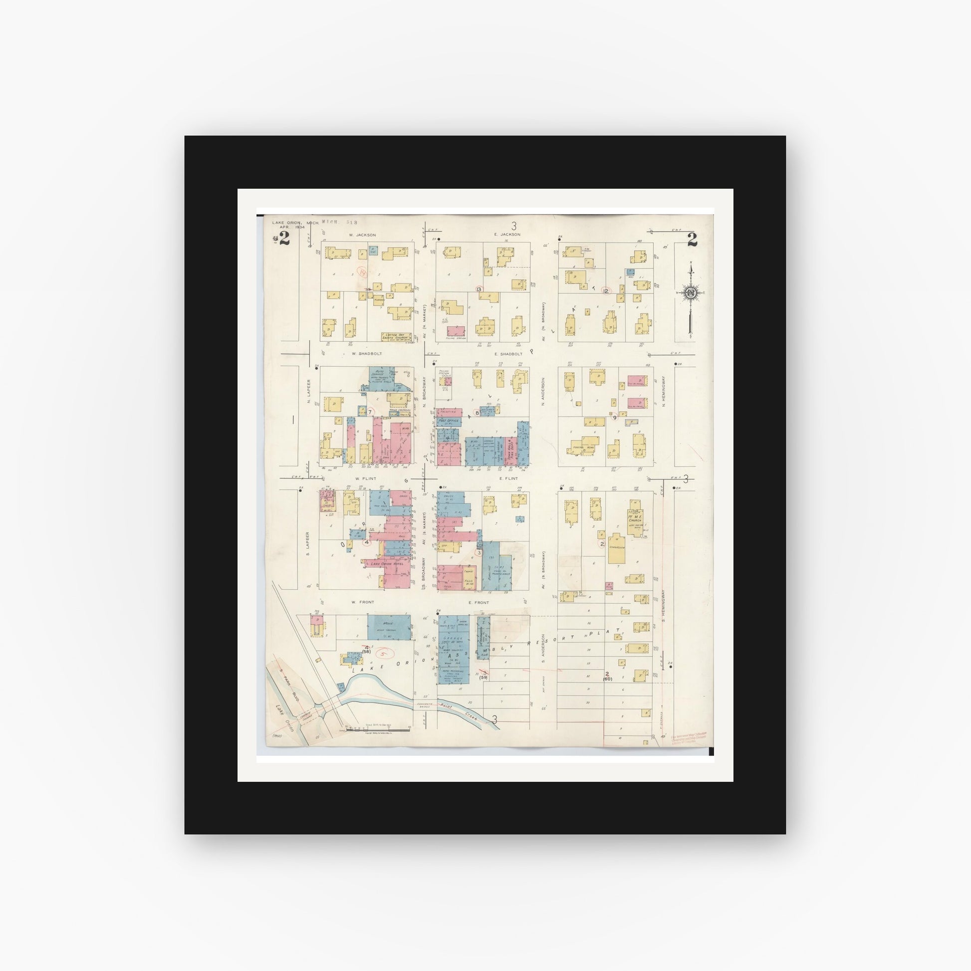 Old map wall art mockup — black gallery frame with white mat — Sanborn Fire Insurance Map from Lake Orion, Oakland County, Michigan (1943), Sheet #0002