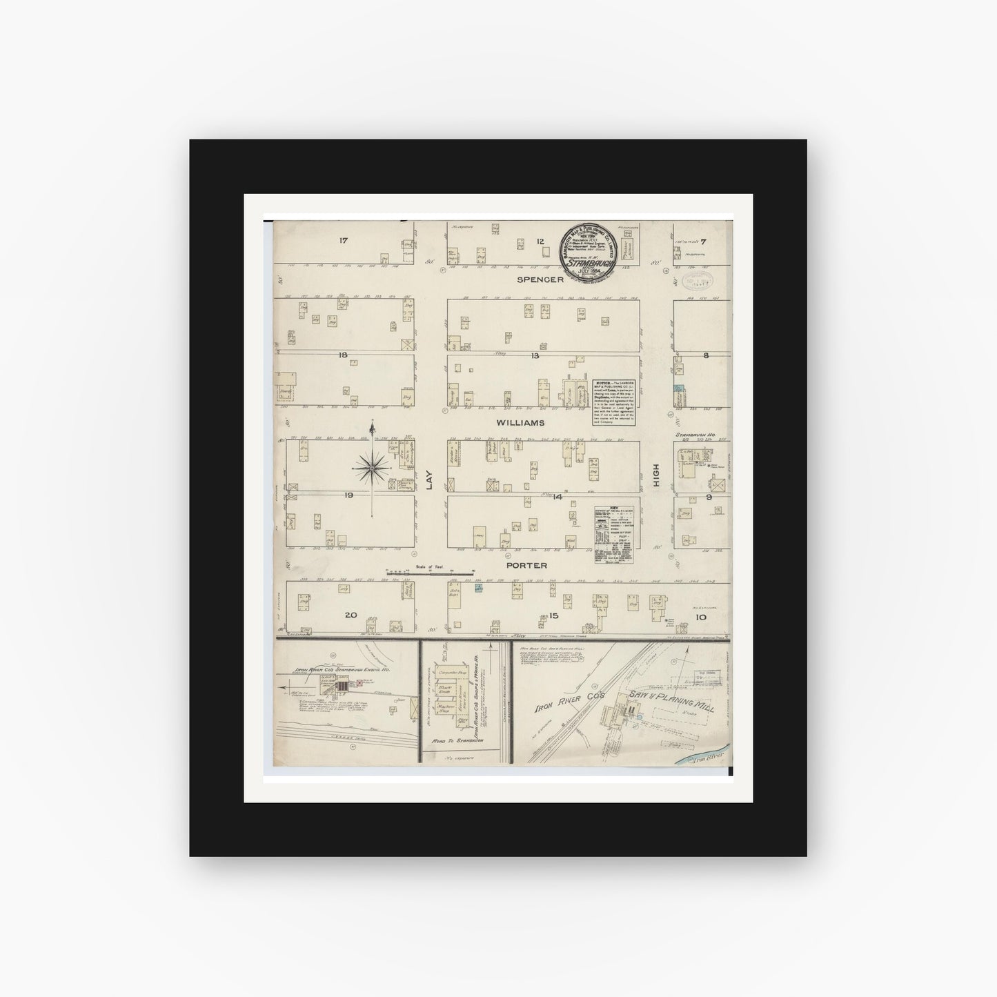 Old map wall art mockup — black gallery frame with white mat — Sanborn Fire Insurance Map from Stambaugh, Iron County, Michigan (1884), Sheet #0001