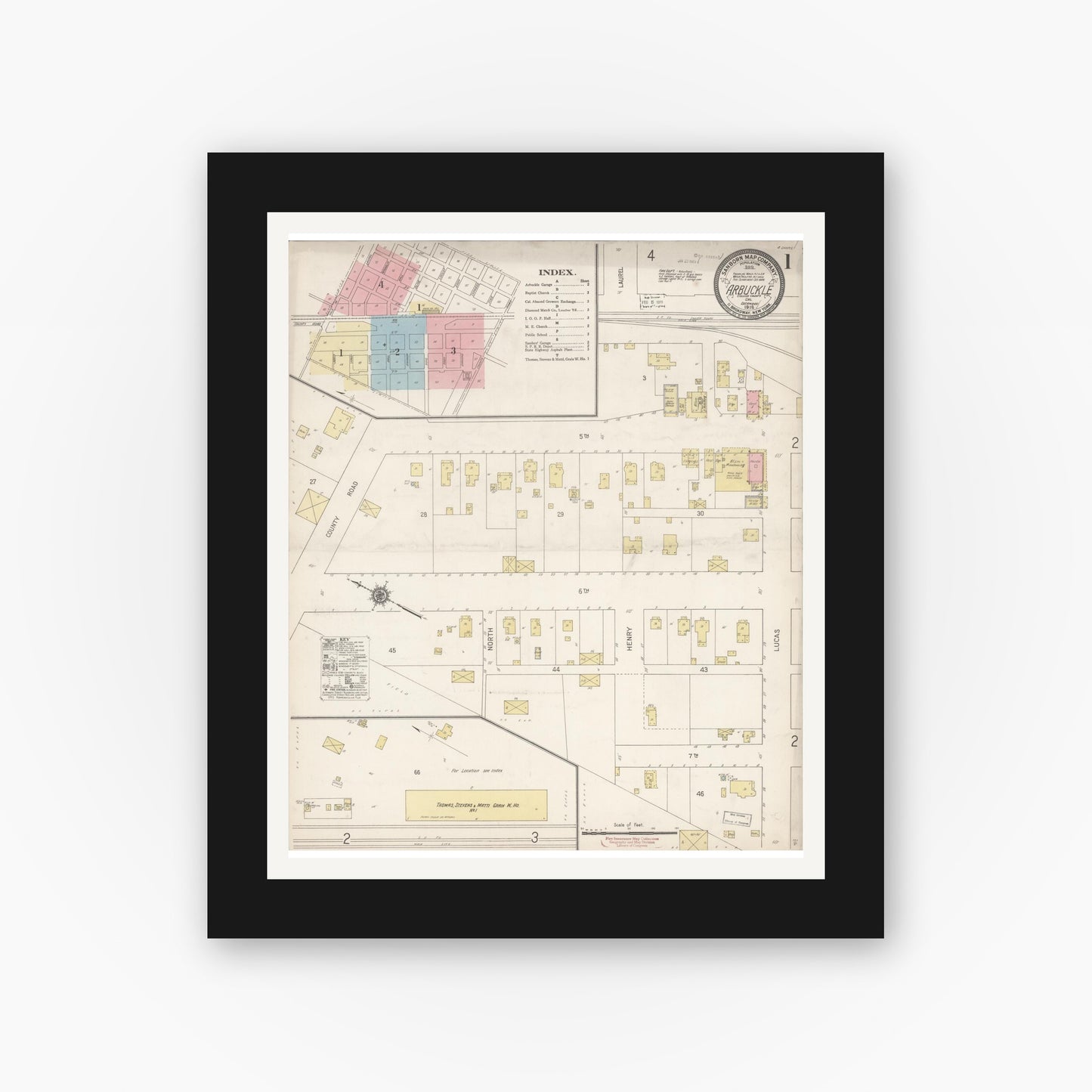 Old map wall art mockup — black gallery frame with white mat — Sanborn Fire Insurance Map from Arbuckle, Colusa County, California (1918), Sheet #0001