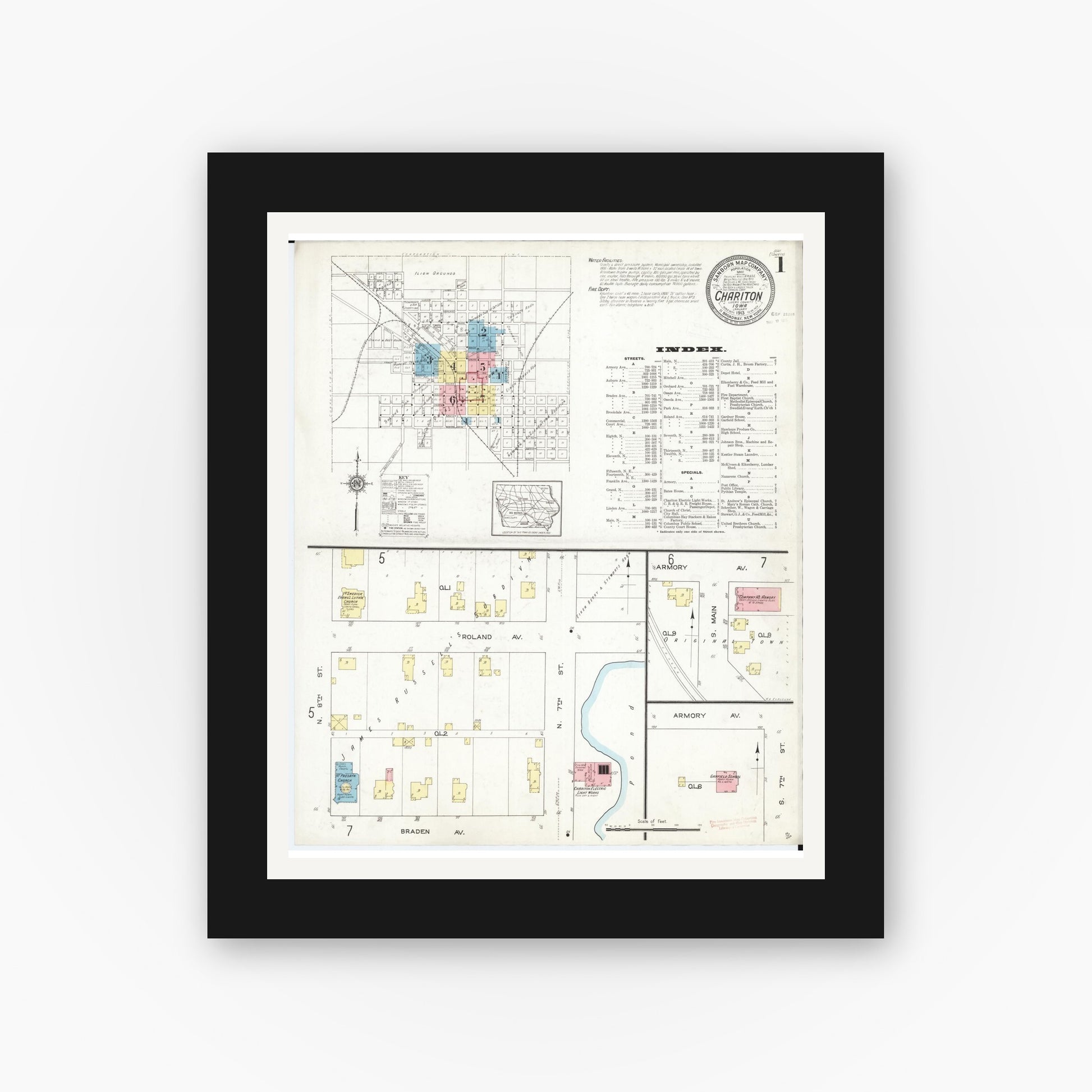 Old map wall art mockup — black gallery frame with white mat — Sanborn Fire Insurance Map from Chariton, Lucas County, Iowa (1913) â€” Complete Set