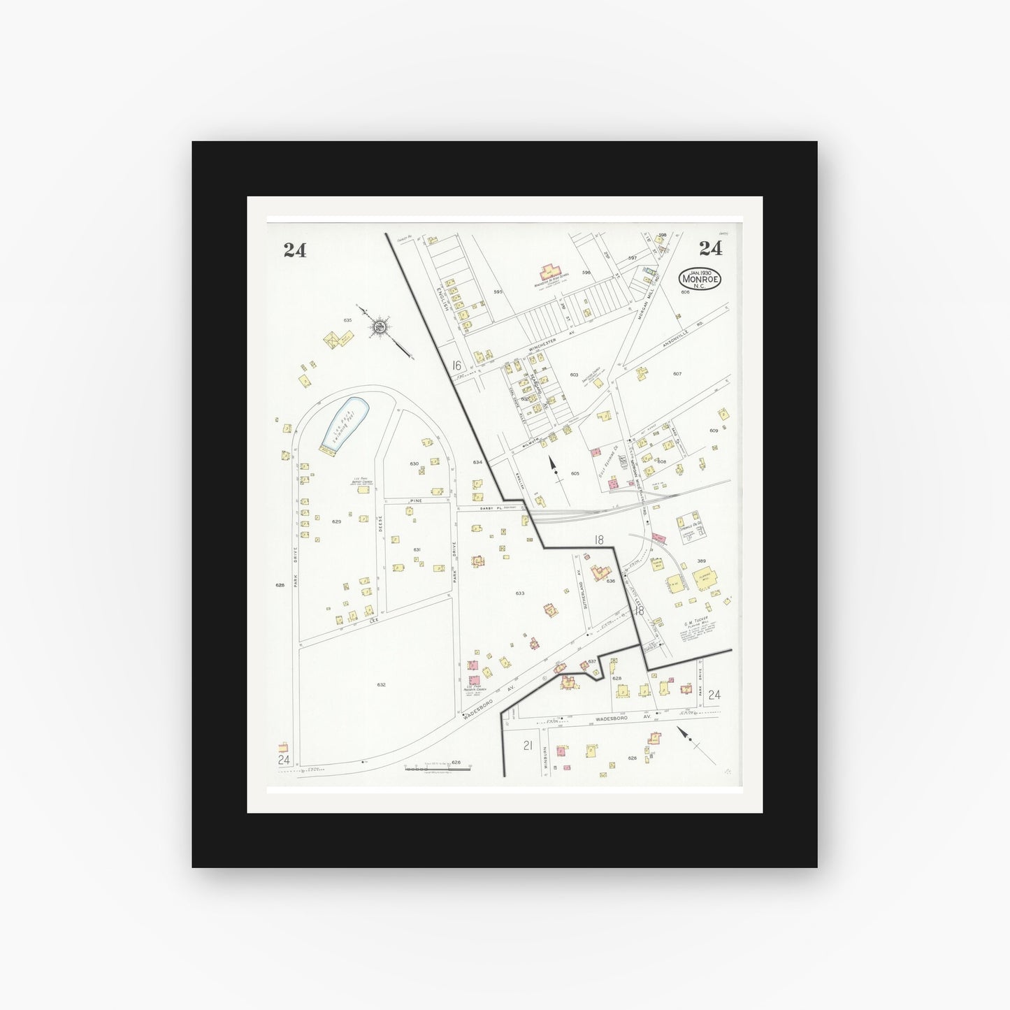 Old map wall art mockup — black gallery frame with white mat — Sanborn Fire Insurance Map from Monroe, Union County, North Carolina (1930), Sheet #0024