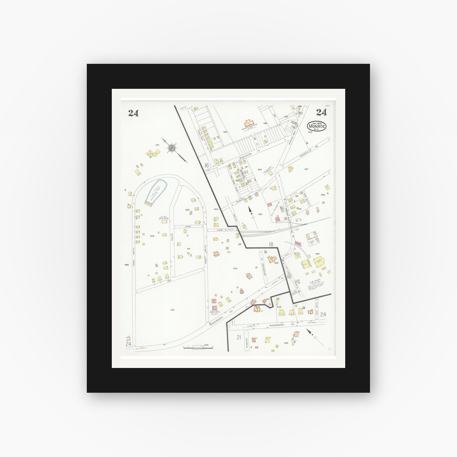Old map wall art mockup — black gallery frame with white mat — Sanborn Fire Insurance Map from Monroe, Union County, North Carolina (1930), Sheet #0024