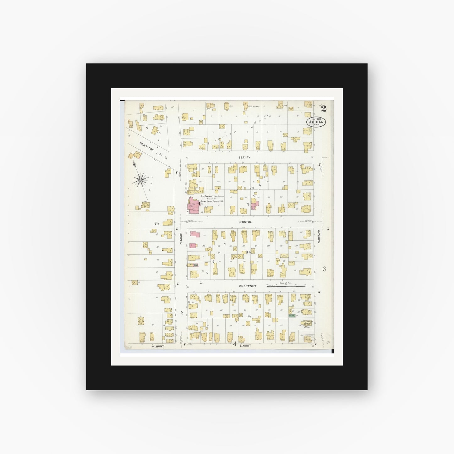 Old map wall art mockup — black gallery frame with white mat — Sanborn Fire Insurance Map from Adrian, Lenawee County, Michigan (1908), Sheet #0002