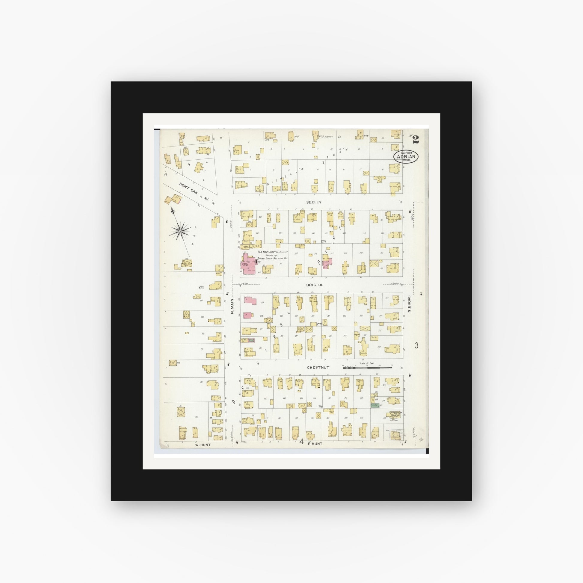 Old map wall art mockup — black gallery frame with white mat — Sanborn Fire Insurance Map from Adrian, Lenawee County, Michigan (1908), Sheet #0002