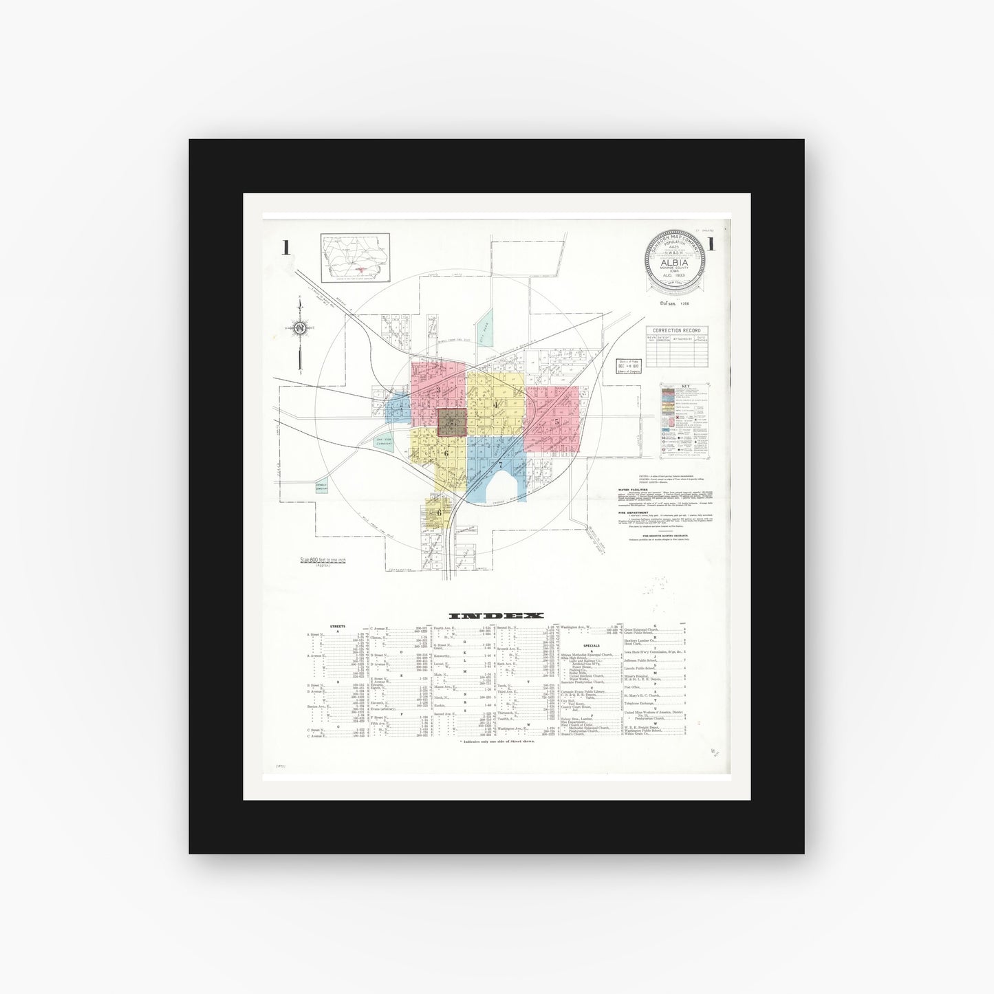 Old map wall art mockup — black gallery frame with white mat — Sanborn Fire Insurance Map from Albia, Monroe County, Iowa (1933) â€” Complete Set