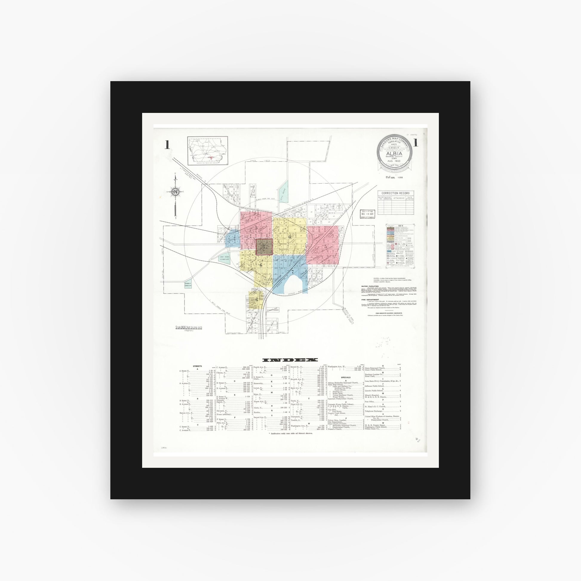 Old map wall art mockup — black gallery frame with white mat — Sanborn Fire Insurance Map from Albia, Monroe County, Iowa (1933) â€” Complete Set