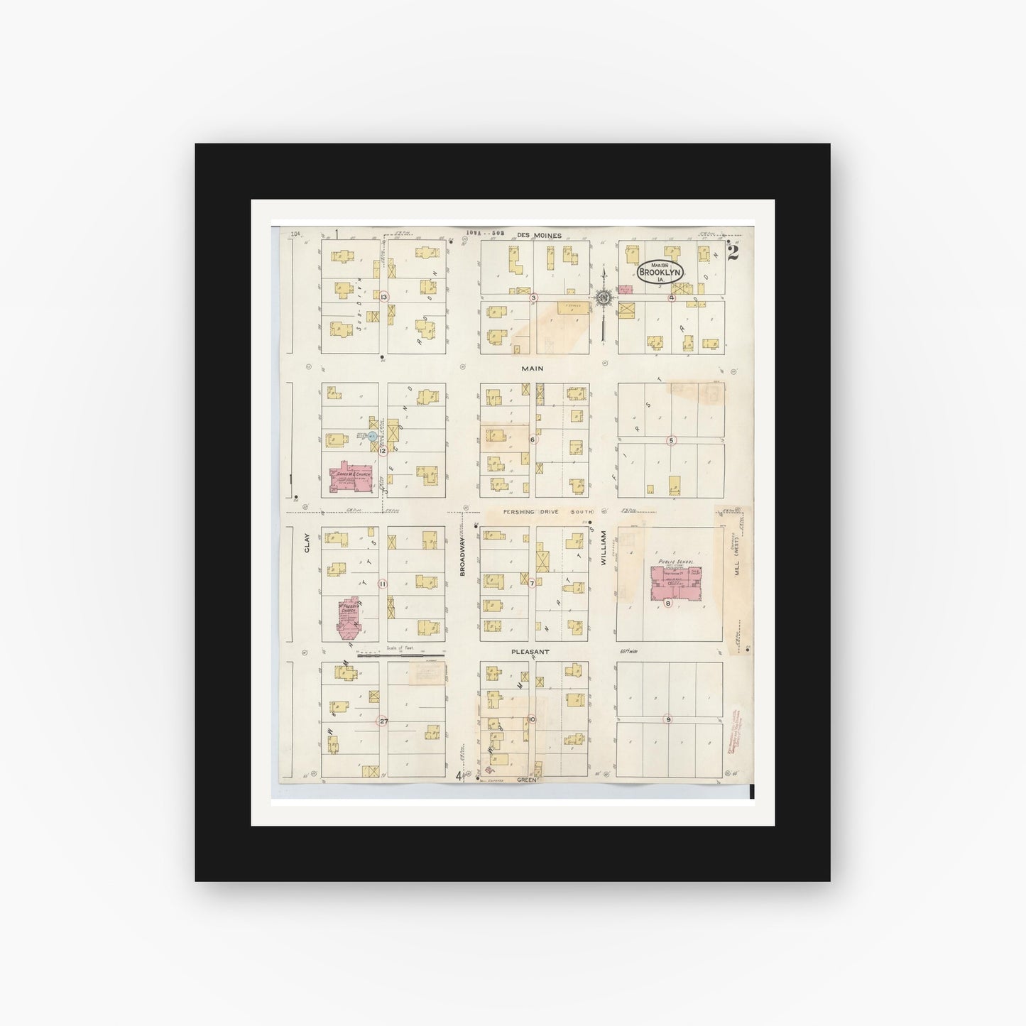 Old map wall art mockup — black gallery frame with white mat — Sanborn Fire Insurance Map from Brooklyn, Poweshiek County, Iowa (1932), Sheet #0002