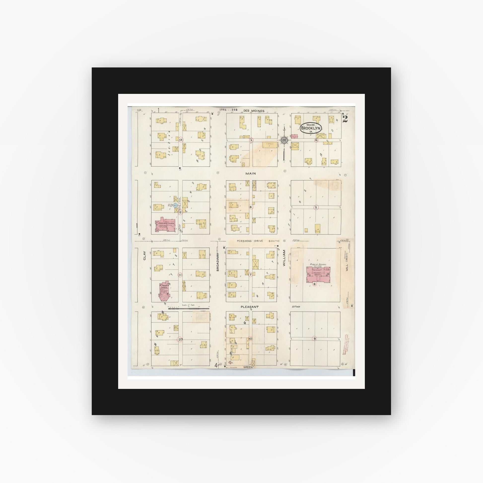 Old map wall art mockup — black gallery frame with white mat — Sanborn Fire Insurance Map from Brooklyn, Poweshiek County, Iowa (1932), Sheet #0002