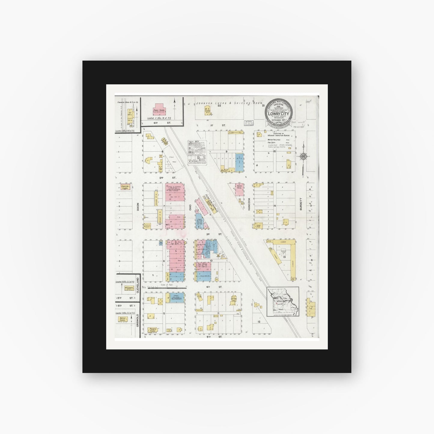 Old map wall art mockup — black gallery frame with white mat — Sanborn Fire Insurance Map from Lowry City, Saint Clair County, Missouri (1927), Sheet #0001