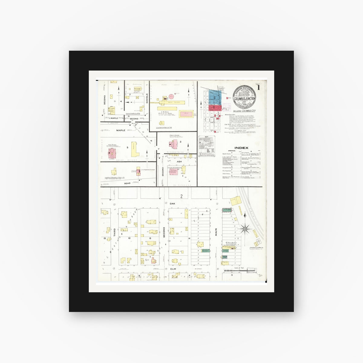 Old map wall art mockup — black gallery frame with white mat — Sanborn Fire Insurance Map from Columbus Junction, Louisa County, Iowa (1909) â€” Complete Set