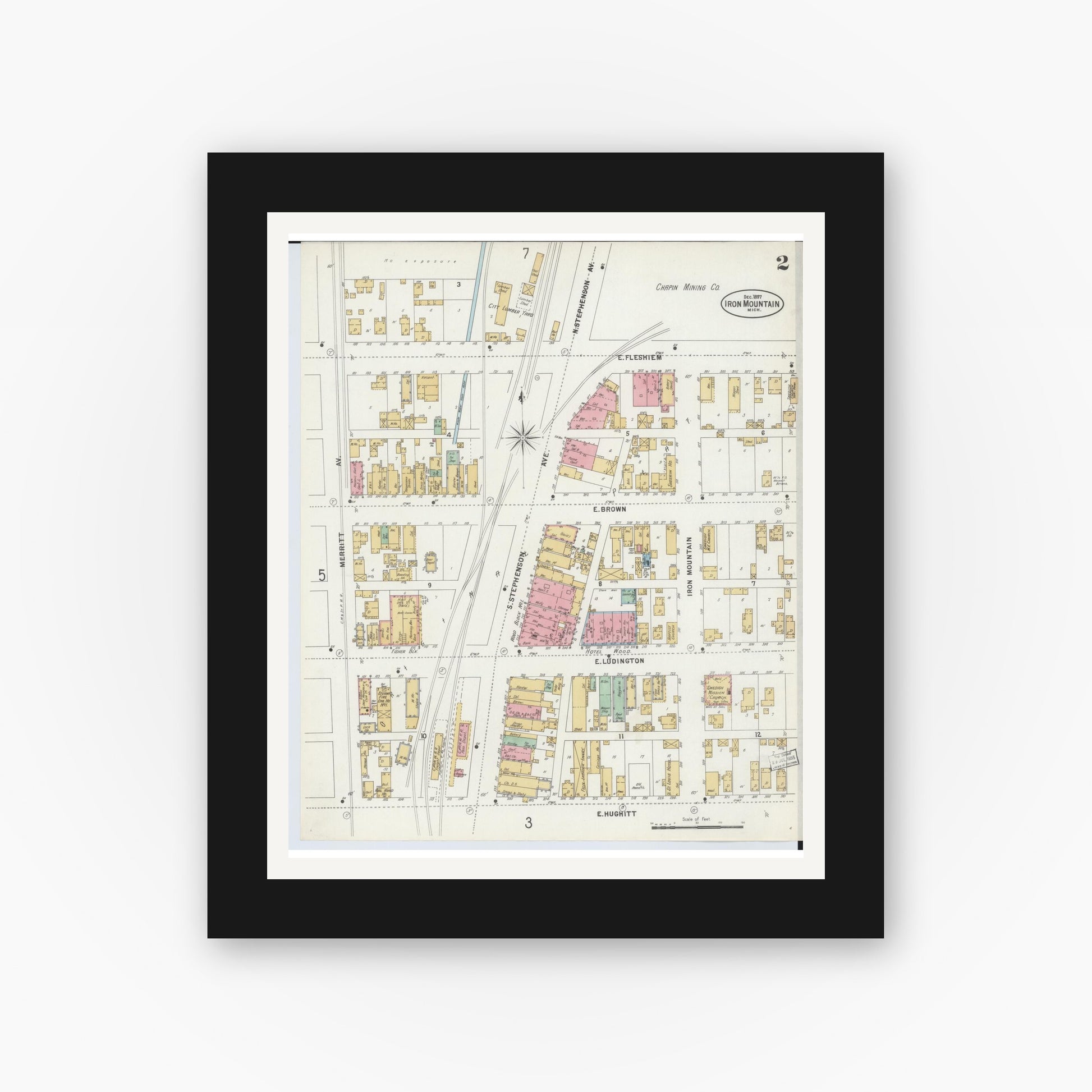 Old map wall art mockup — black gallery frame with white mat — Sanborn Fire Insurance Map from Iron Mountain, Dickinson County, Michigan (1897), Sheet #0002
