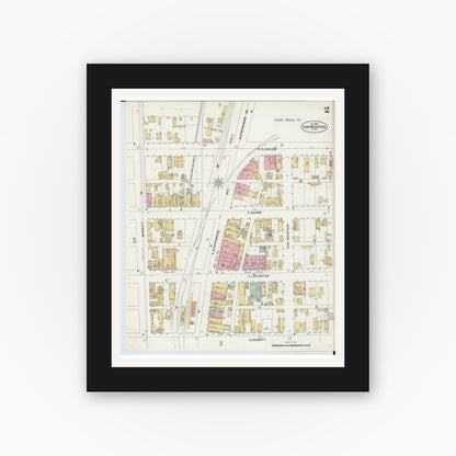 Old map wall art mockup — black gallery frame with white mat — Sanborn Fire Insurance Map from Iron Mountain, Dickinson County, Michigan (1897), Sheet #0002