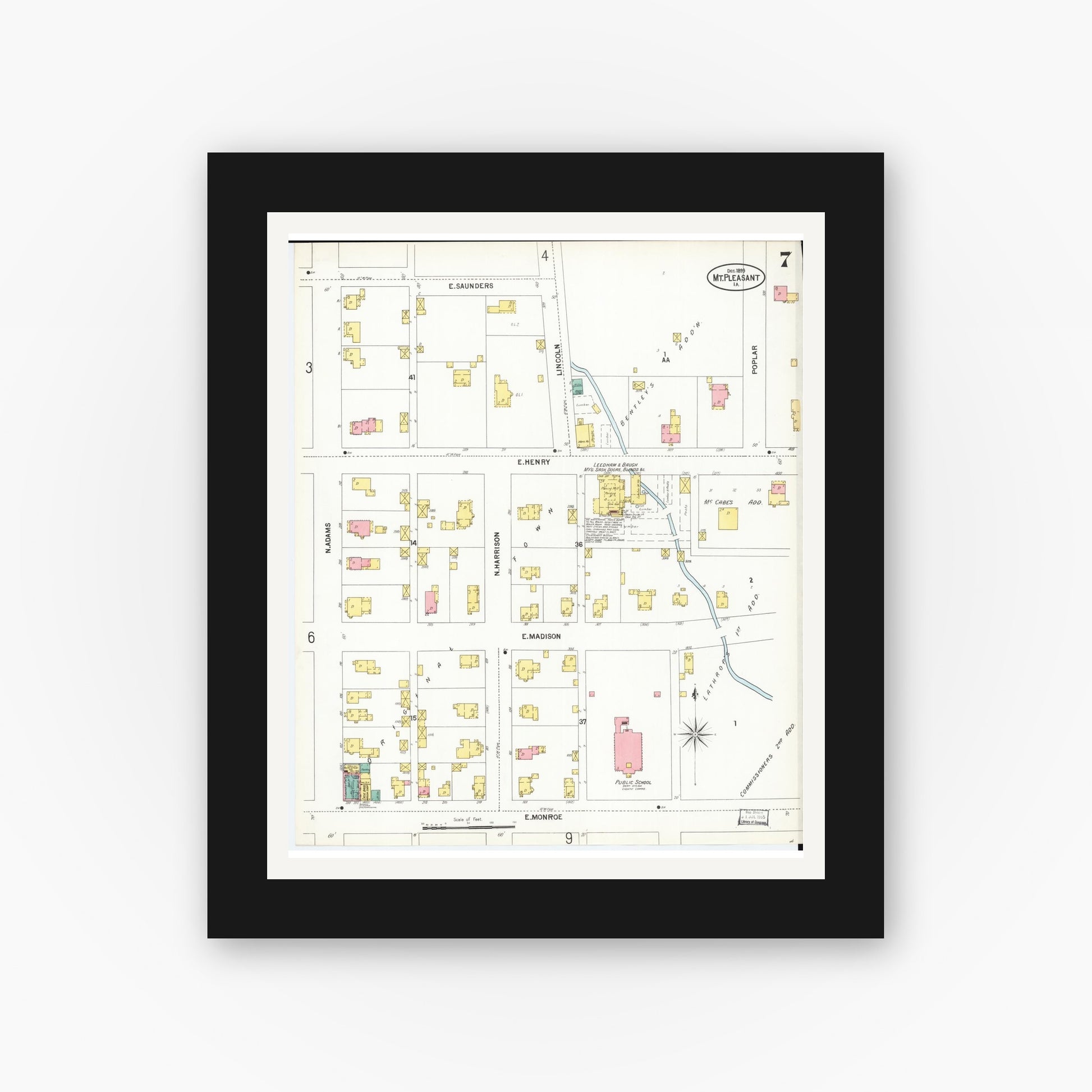 Old map wall art mockup — black gallery frame with white mat — Sanborn Fire Insurance Map from Mount Pleasant, Henry County, Iowa (1899), Sheet #0007