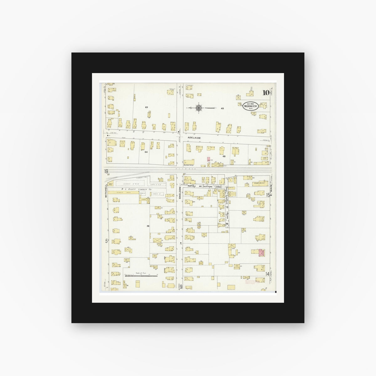 Old map wall art mockup — black gallery frame with white mat — Sanborn Fire Insurance Map from Norwich, Chenango County, New York (1910), Sheet #0010