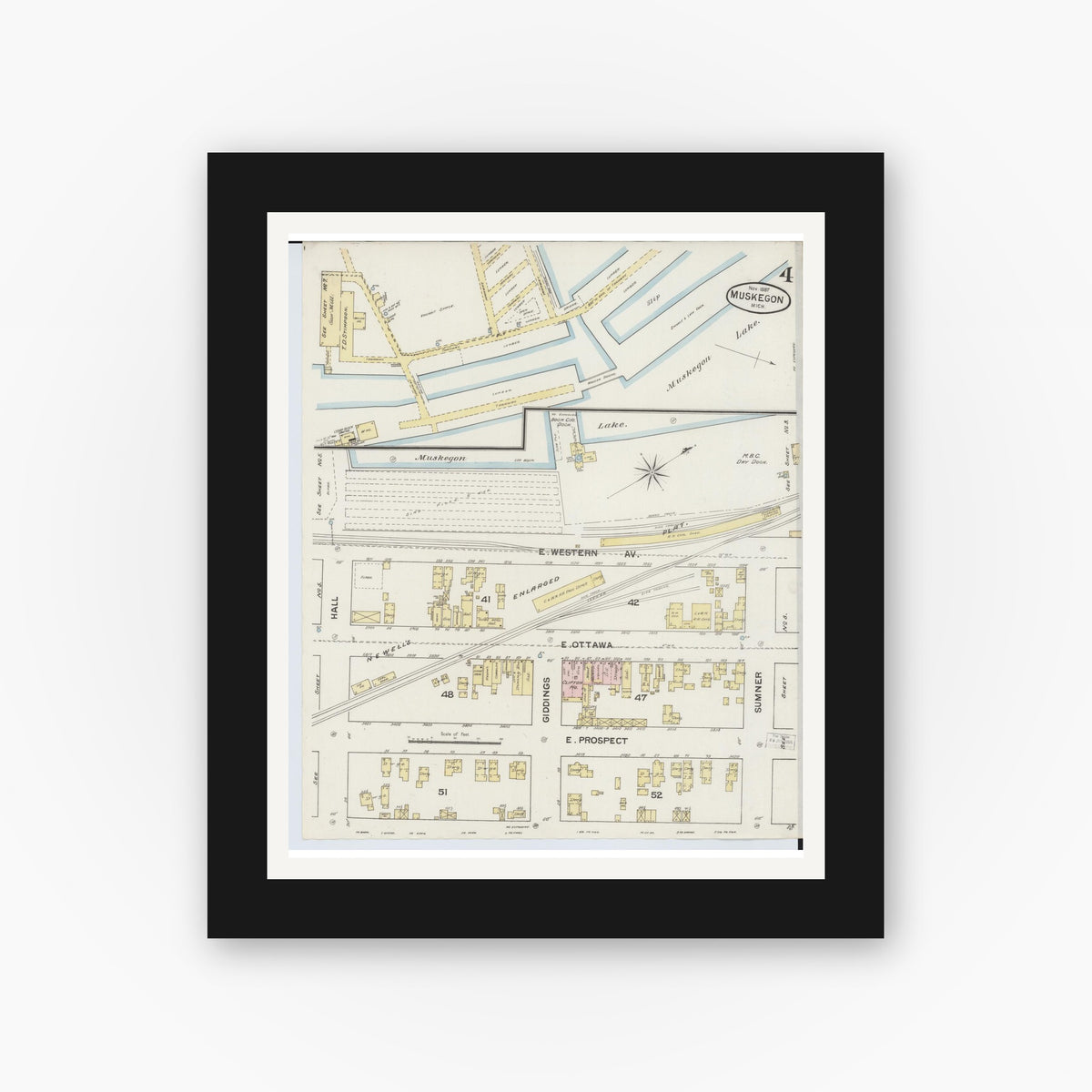 Old map wall art mockup — black gallery frame with white mat — Sanborn Fire Insurance Map from Muskegon, Muskegon County, Michigan (1887), Sheet #0004