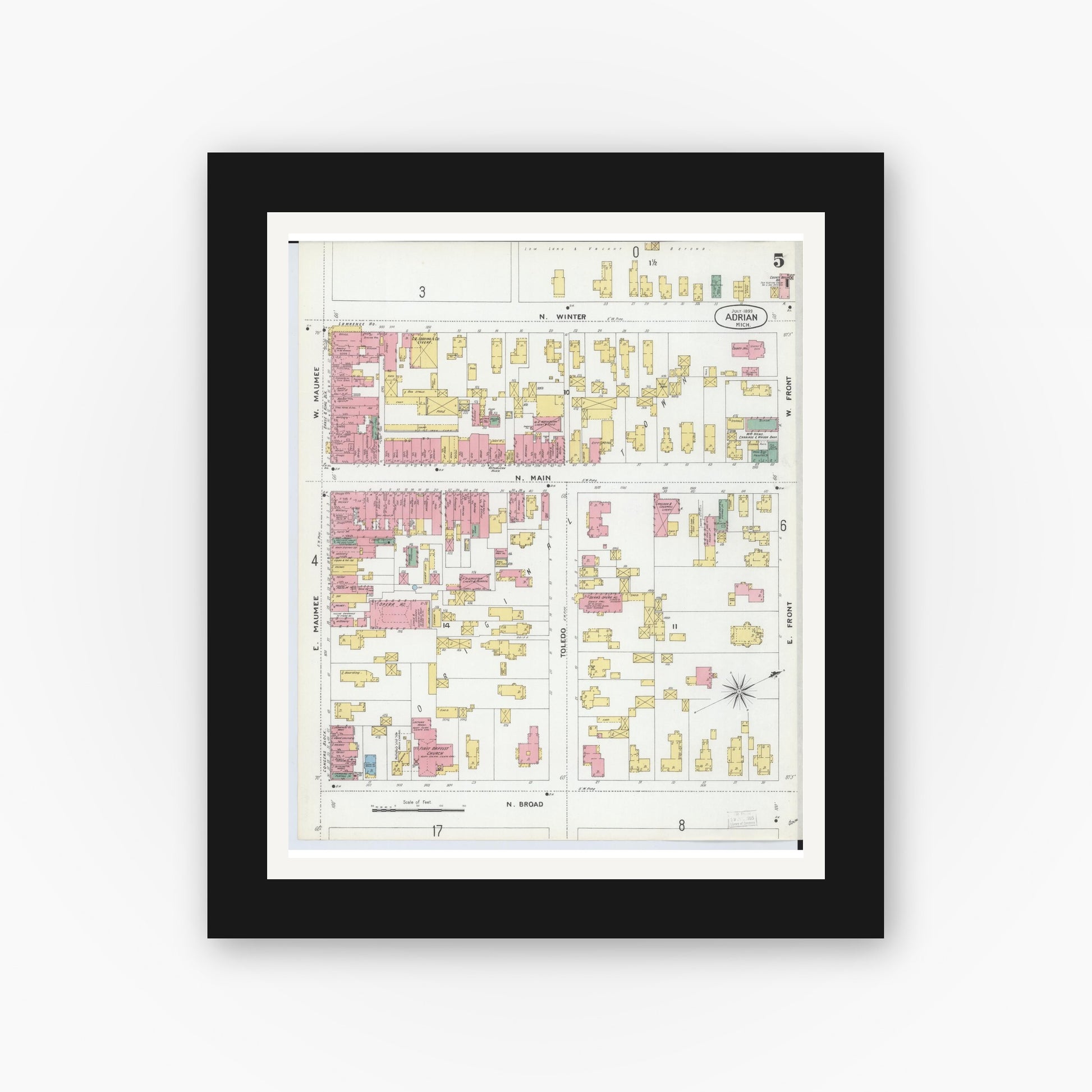 Old map wall art mockup — black gallery frame with white mat — Sanborn Fire Insurance Map from Adrian, Lenawee County, Michigan (1899), Sheet #0005