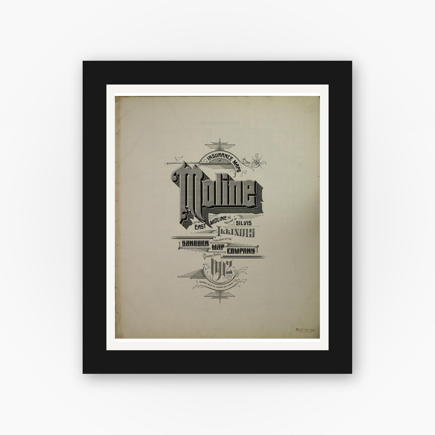 Old map wall art mockup — black gallery frame with white mat — Sanborn Fire Insurance Map from Moline, Rock Island County, Illinois (1912), Sheet #0001