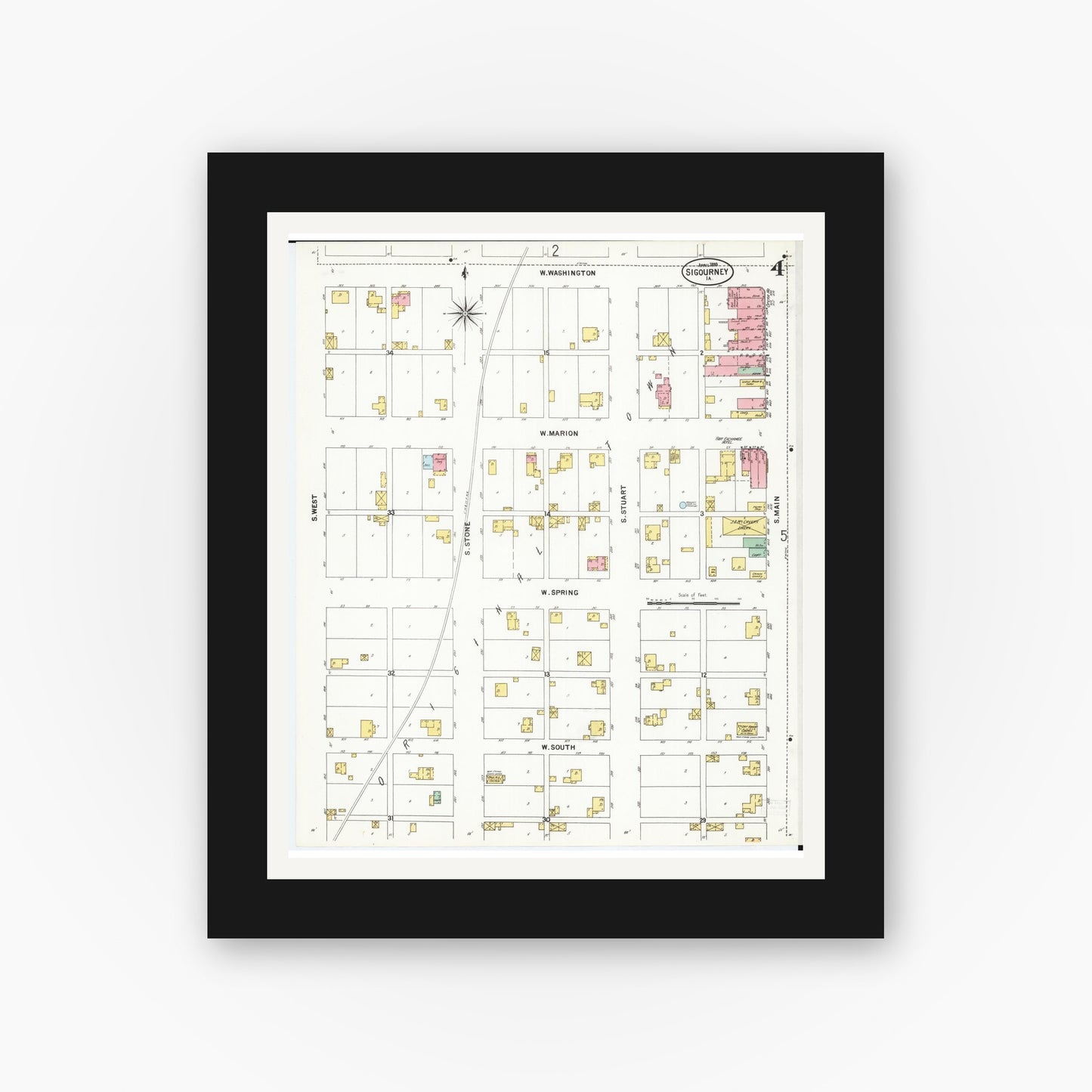 Old map wall art mockup — black gallery frame with white mat — Sanborn Fire Insurance Map from Sigourney, Kiokuk County, Iowa (1899), Sheet #0004