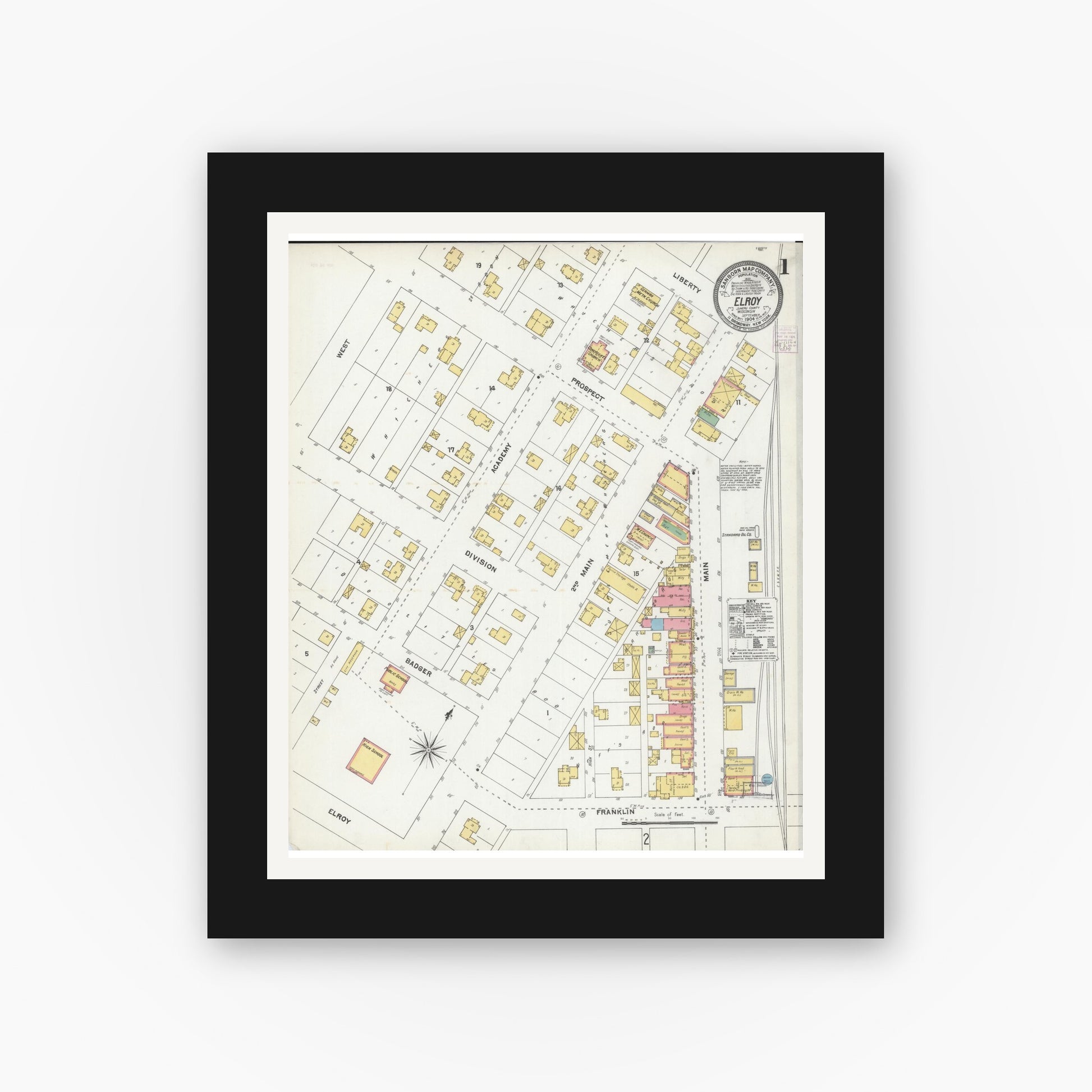 Old map wall art mockup — black gallery frame with white mat — Sanborn Fire Insurance Map from Elroy, Juneau County, Wisconsin (1904), Sheet #0001