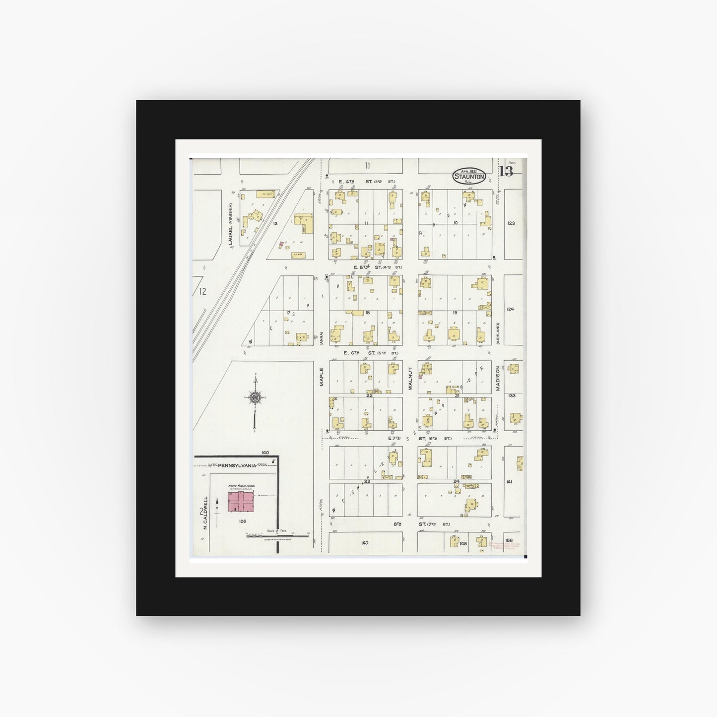 Old map wall art mockup — black gallery frame with white mat — Sanborn Fire Insurance Map from Staunton, Macoupin County, Illinois (1921), Sheet #0013