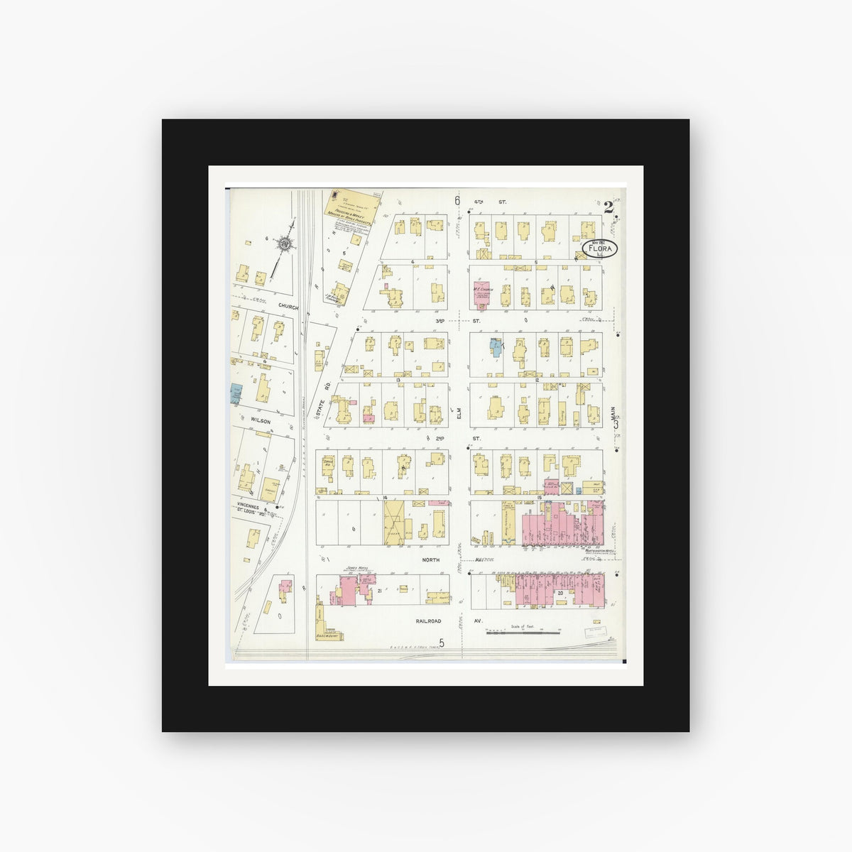 Old map wall art mockup — black gallery frame with white mat — Sanborn Fire Insurance Map from Flora, Clay County, Illinois (1912), Sheet #0002