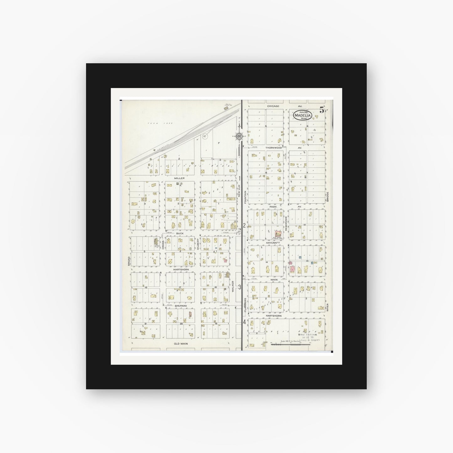Old map wall art mockup — black gallery frame with white mat — Sanborn Fire Insurance Map from Madelia, Watonwan County, Minnesota (1914), Sheet #0005