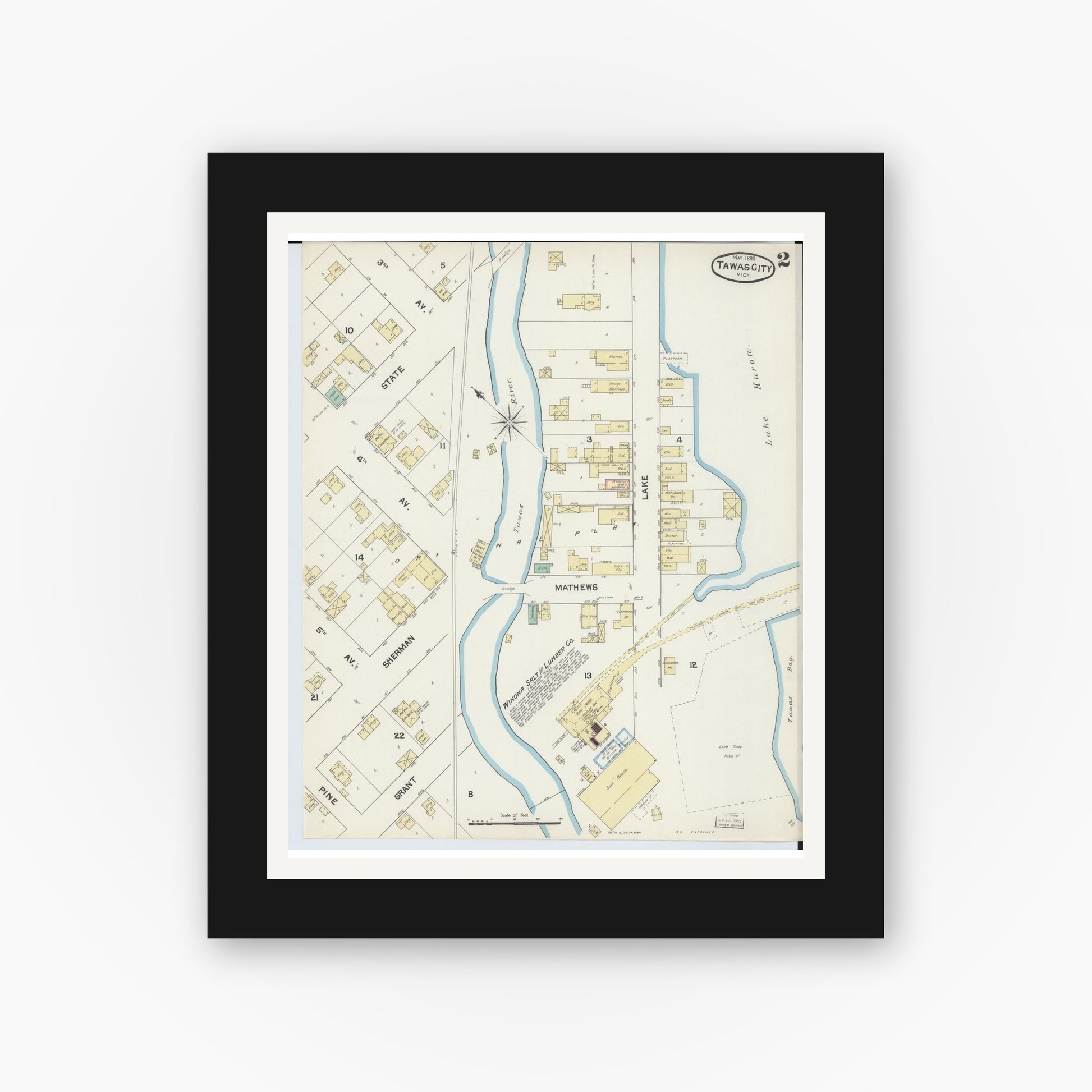 Old map wall art mockup — black gallery frame with white mat — Sanborn Fire Insurance Map from East Tawas, Iosco County, Michigan (1890), Sheet #0002